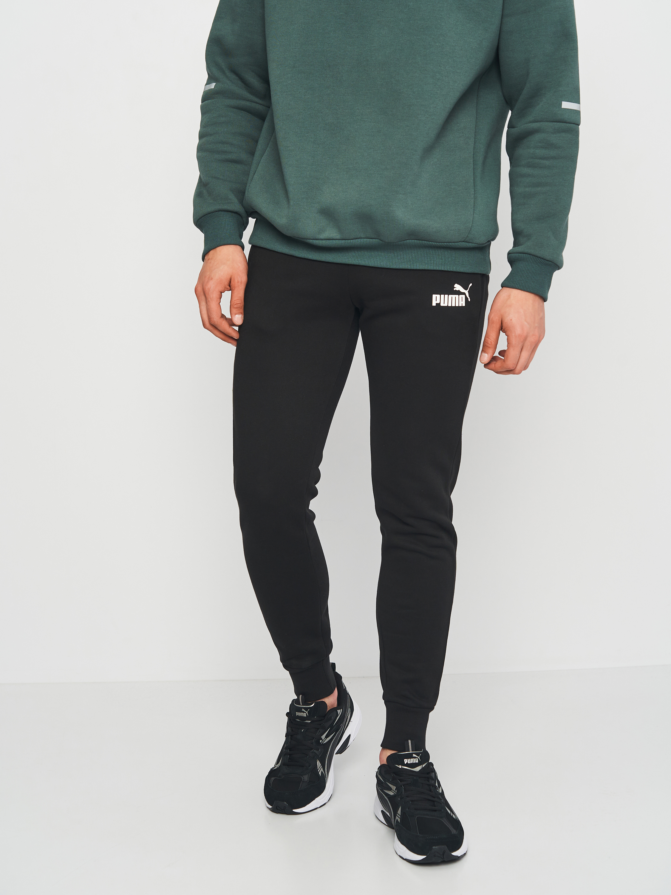 Акція на Спортивні штани на флісі чоловічі Puma Ess Slim Pants Fl 58674801 S Black від Rozetka