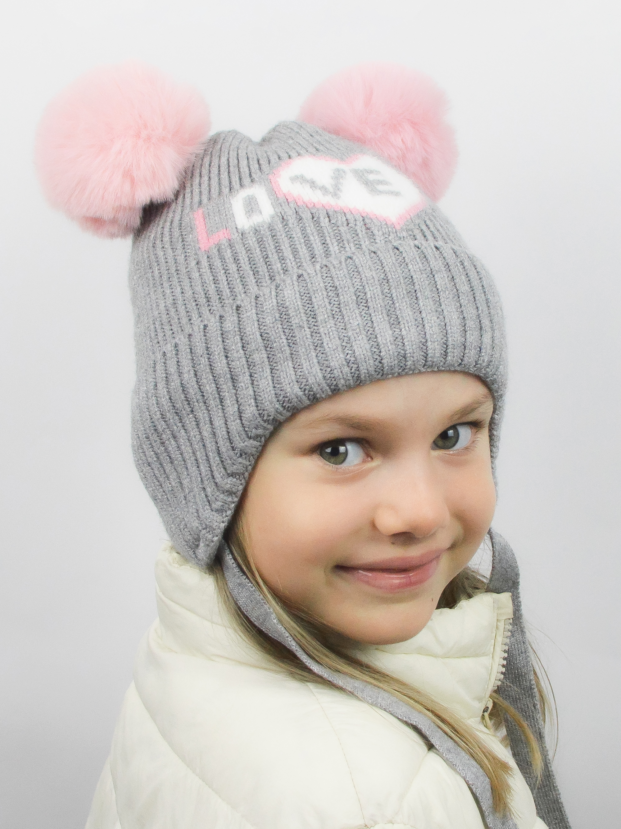 Акція на Дитяча зимова шапка-біні в'язана на зав'язках з помпоном для дівчинки Noviti CZ033-G-01 42-44 Сірий меланж від Rozetka