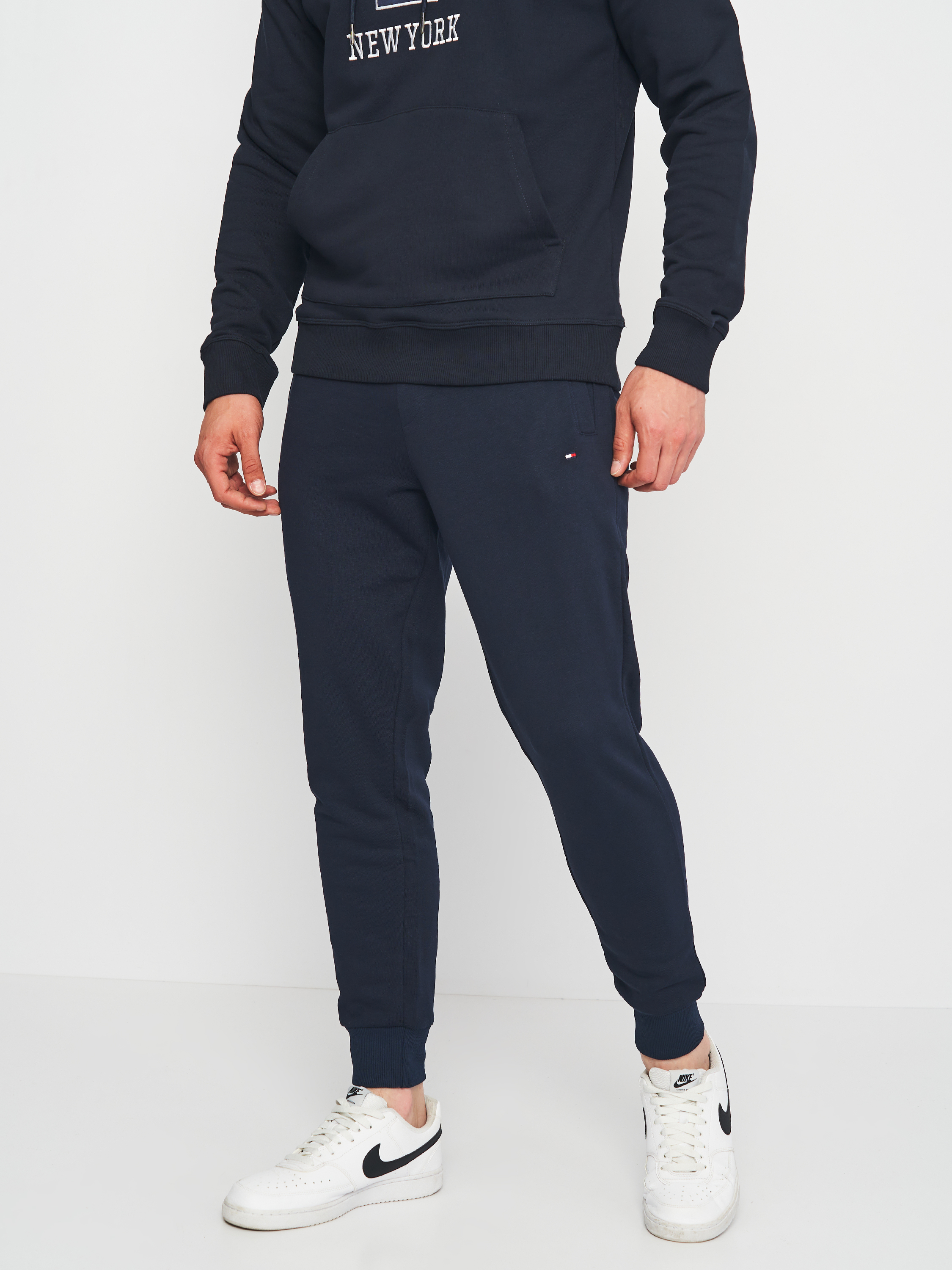 Акція на Спортивні штани чоловічі Tommy Hilfiger 11206.2 S (44) Темно-сині від Rozetka