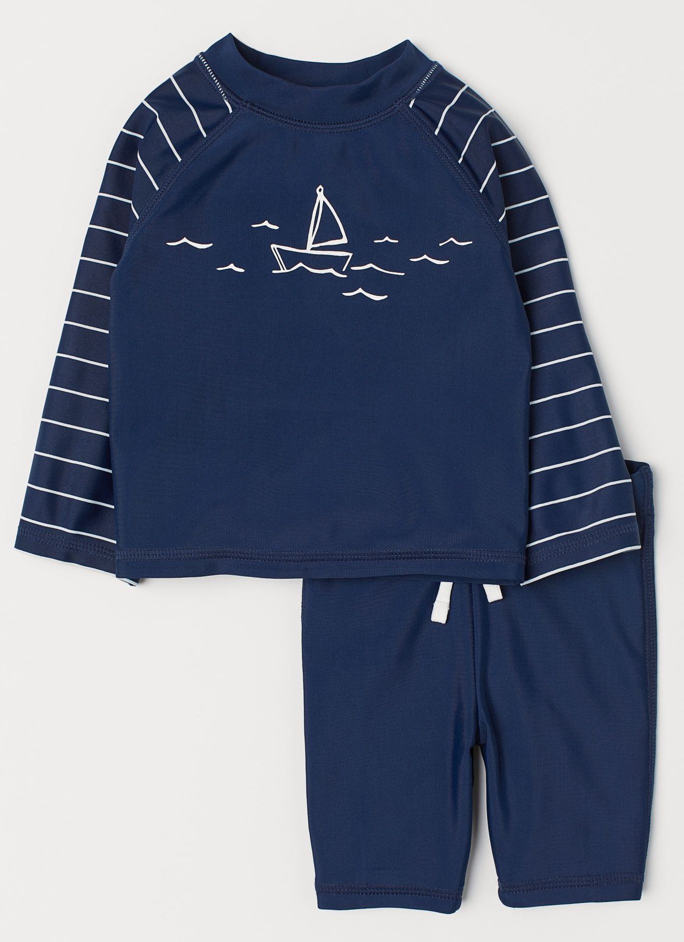 

Купальный комплект (футболка с длинными рукавами + шорты) H&M 2910-686342 62-68 см Темно-синий