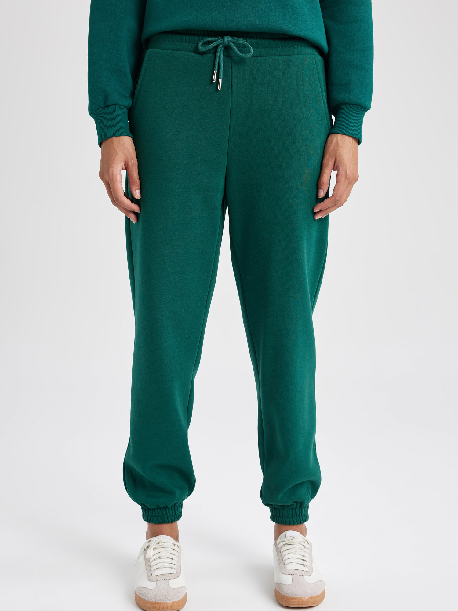 Акція на Спортивні штани жіночі DeFacto V2700AZ-GN671 L Зелені від Rozetka