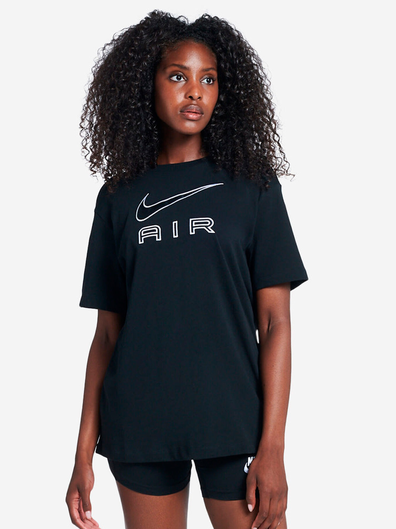 Акція на Футболка длинная женская Nike Tee Nike Air DR8982-010 S Черный/Белый від Rozetka