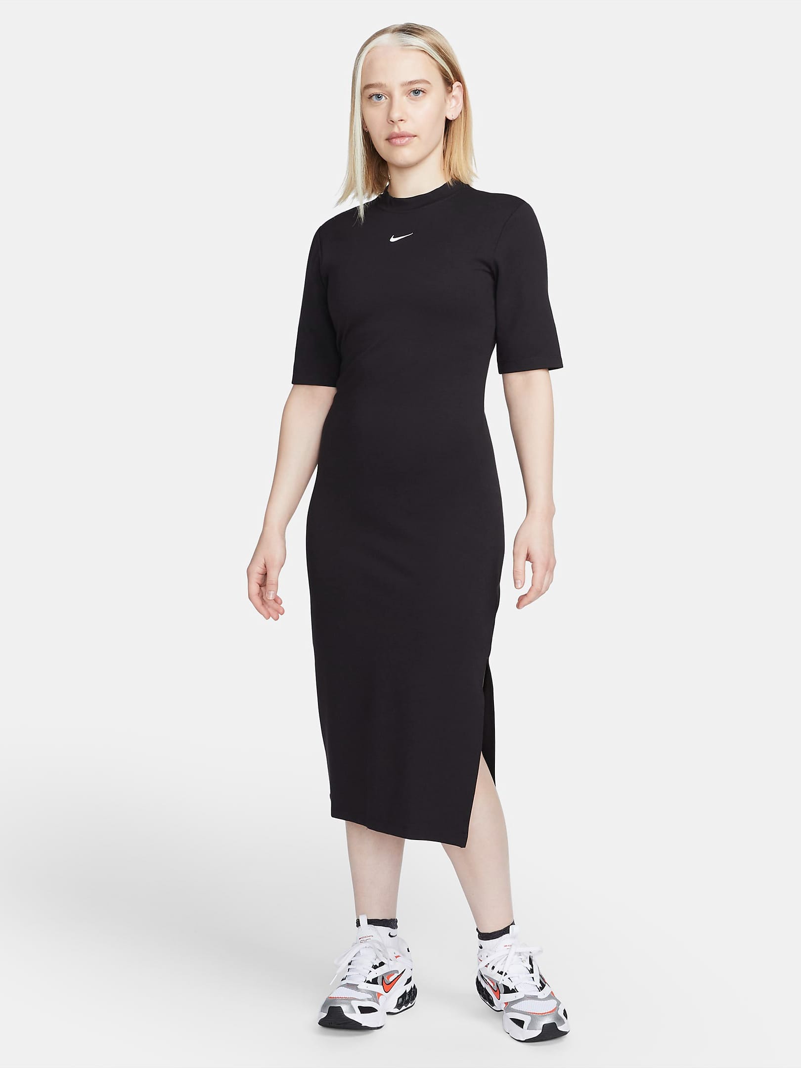 Акція на Платье-футболка миди летнее женское Nike Essential Midi Dress DV7878-010 XL Черное від Rozetka