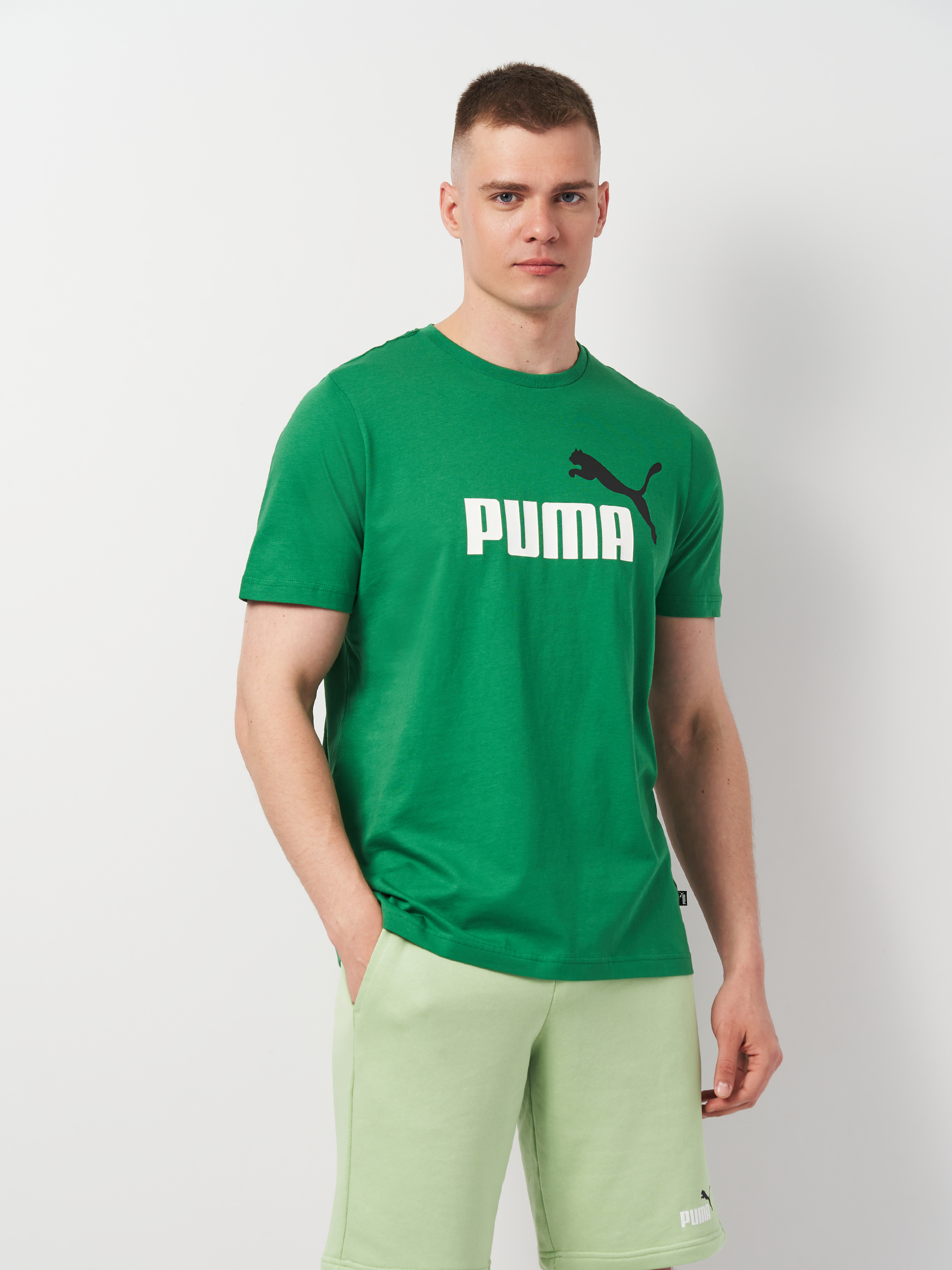 Акція на Футболка чоловіча Puma Essentials+ 58675986 2XL Зелена з принтом від Rozetka