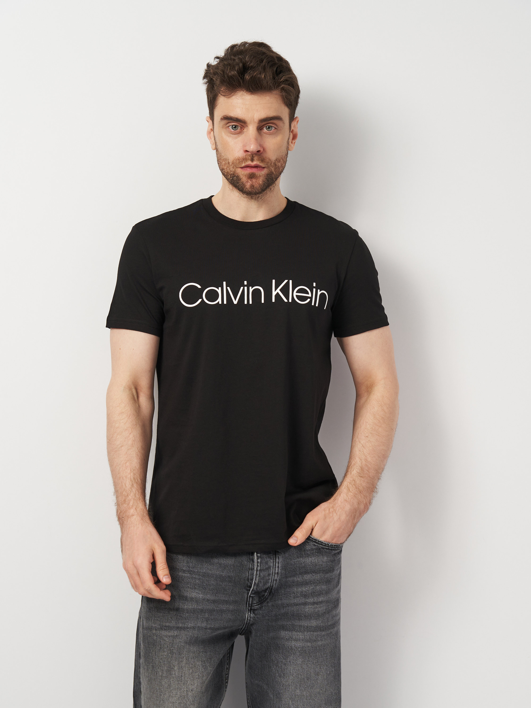 Акція на Футболка чоловіча Calvin Klein Jeans 11322.1 L (48) Чорна від Rozetka