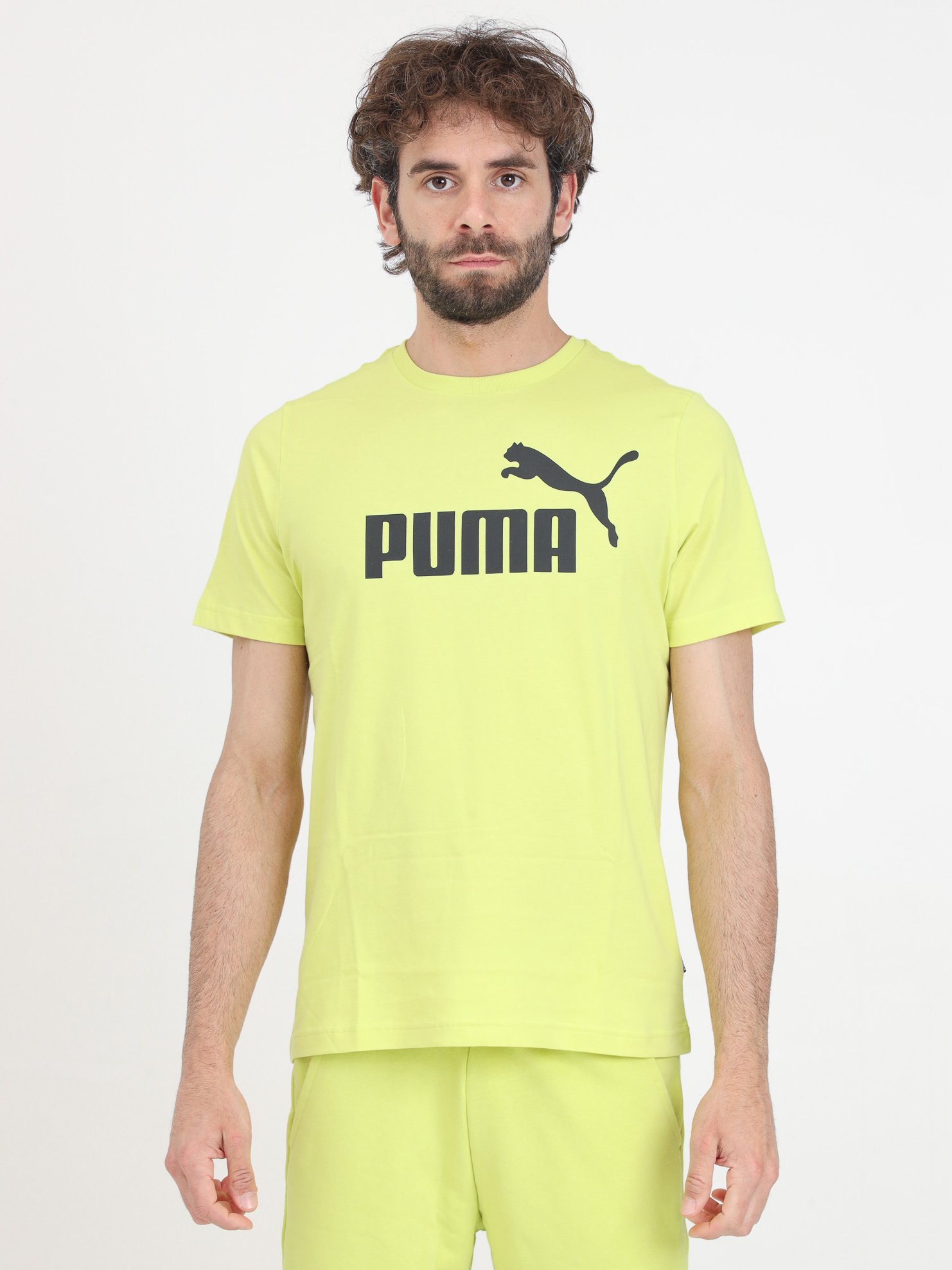 Акція на Футболка чоловіча Puma Essentials Foundation 58666766 M Лаймова з принтом від Rozetka