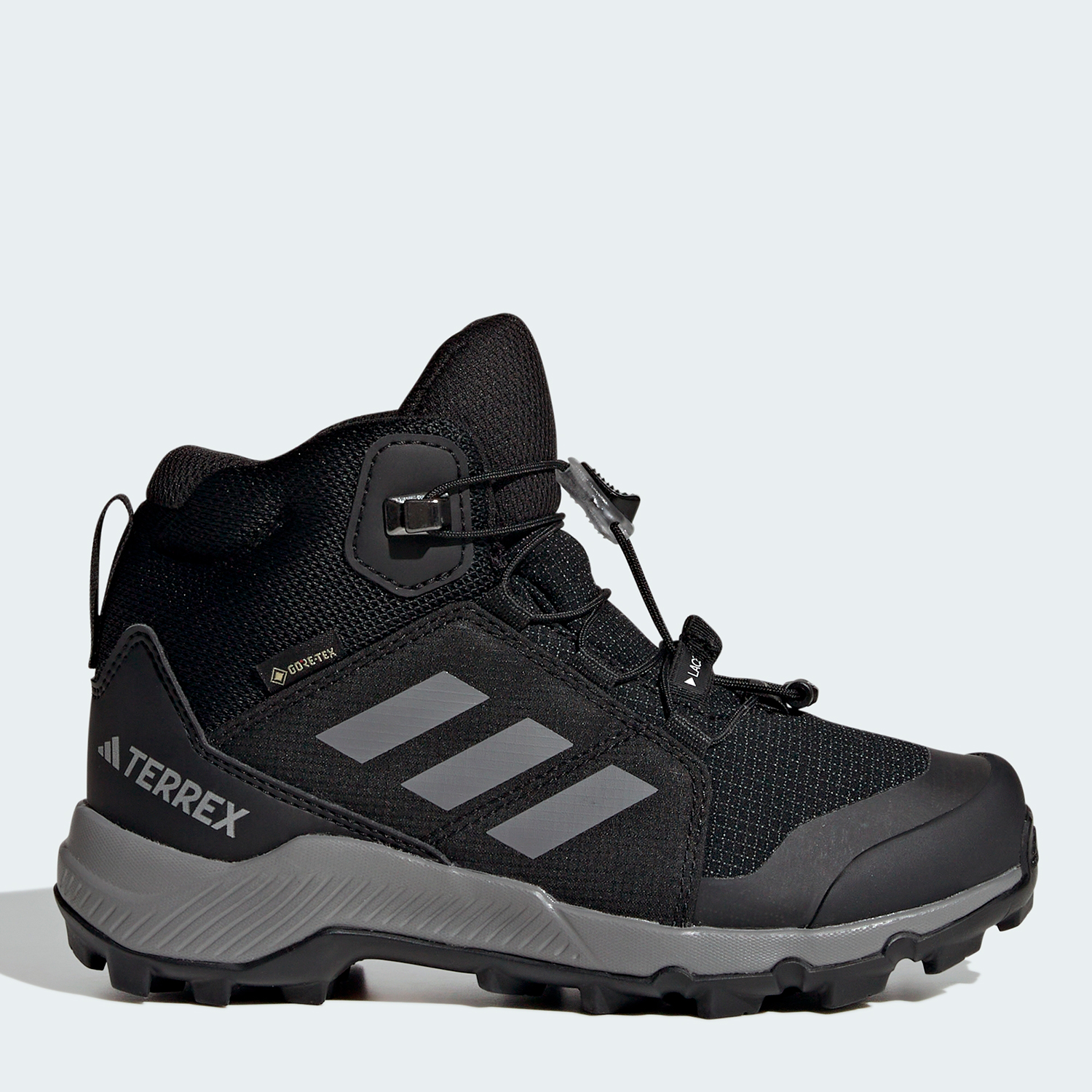 Акція на Дитячі демісезонні черевики для хлопчика Adidas Terrex Mid Gtx K IF7522 30.5 Чорні від Rozetka