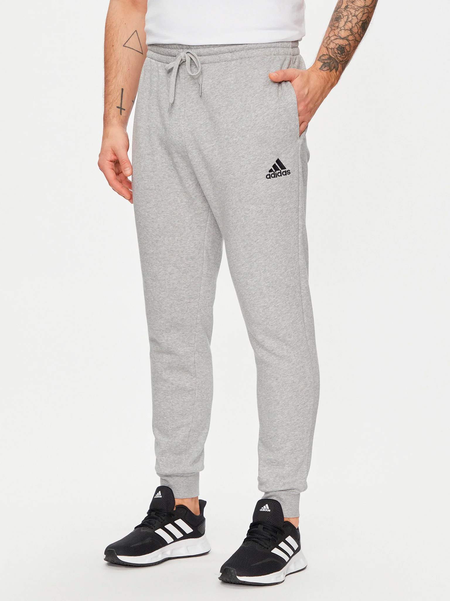 Акція на Спортивні штани утеплені чоловічі Adidas M Feelcozy Pant HL2230 S Сірі від Rozetka