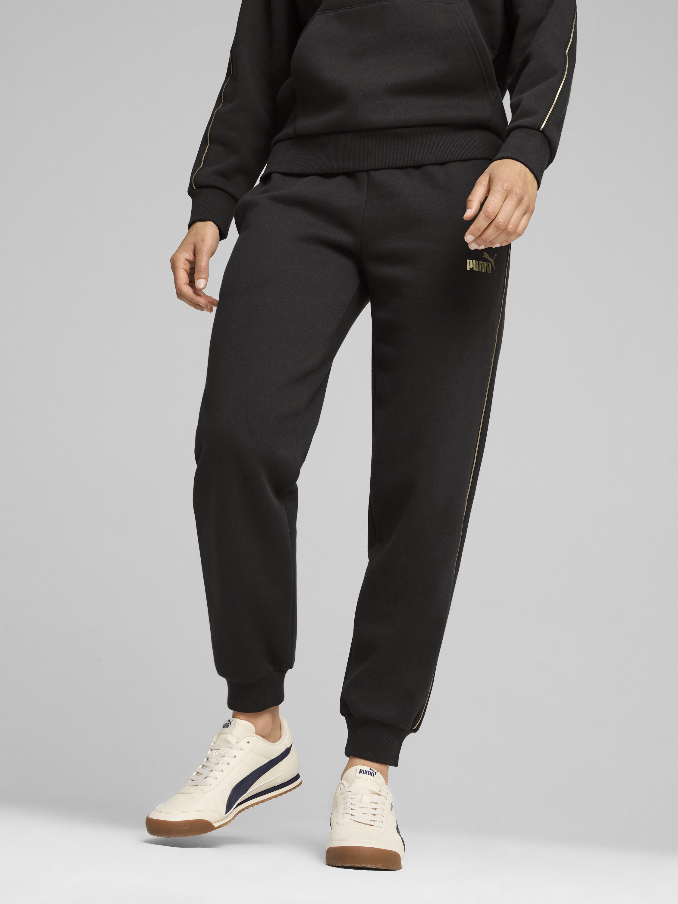 Акція на Спортивні штани на флісі жіночі Puma Minimal Gold Sweatpants Fl 68529601 XS Чорні від Rozetka