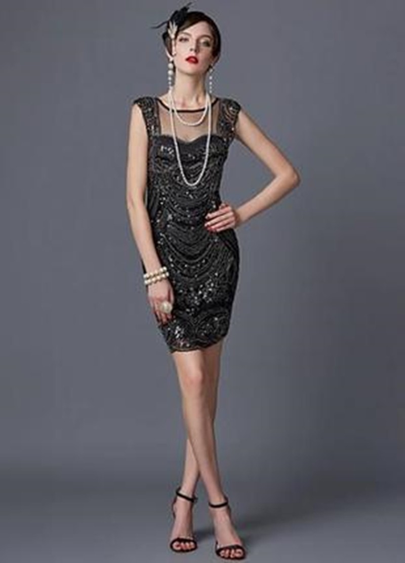 

Нарядное блестящее черное платье FashionYouWant M/L черный 43372372
