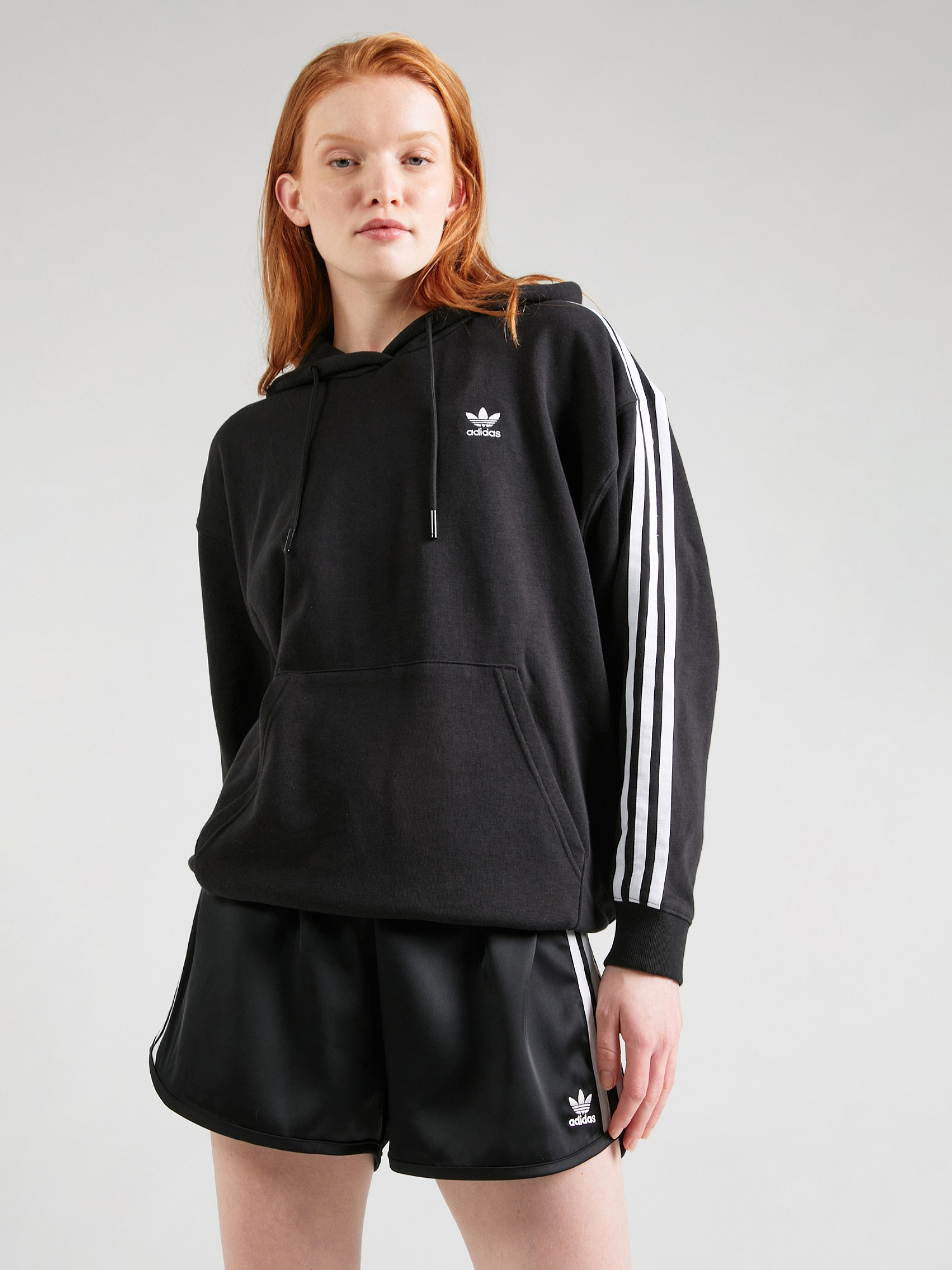 Акція на Худі оверсайз жіноче adidas Originals IU2418 L Чорне від Rozetka