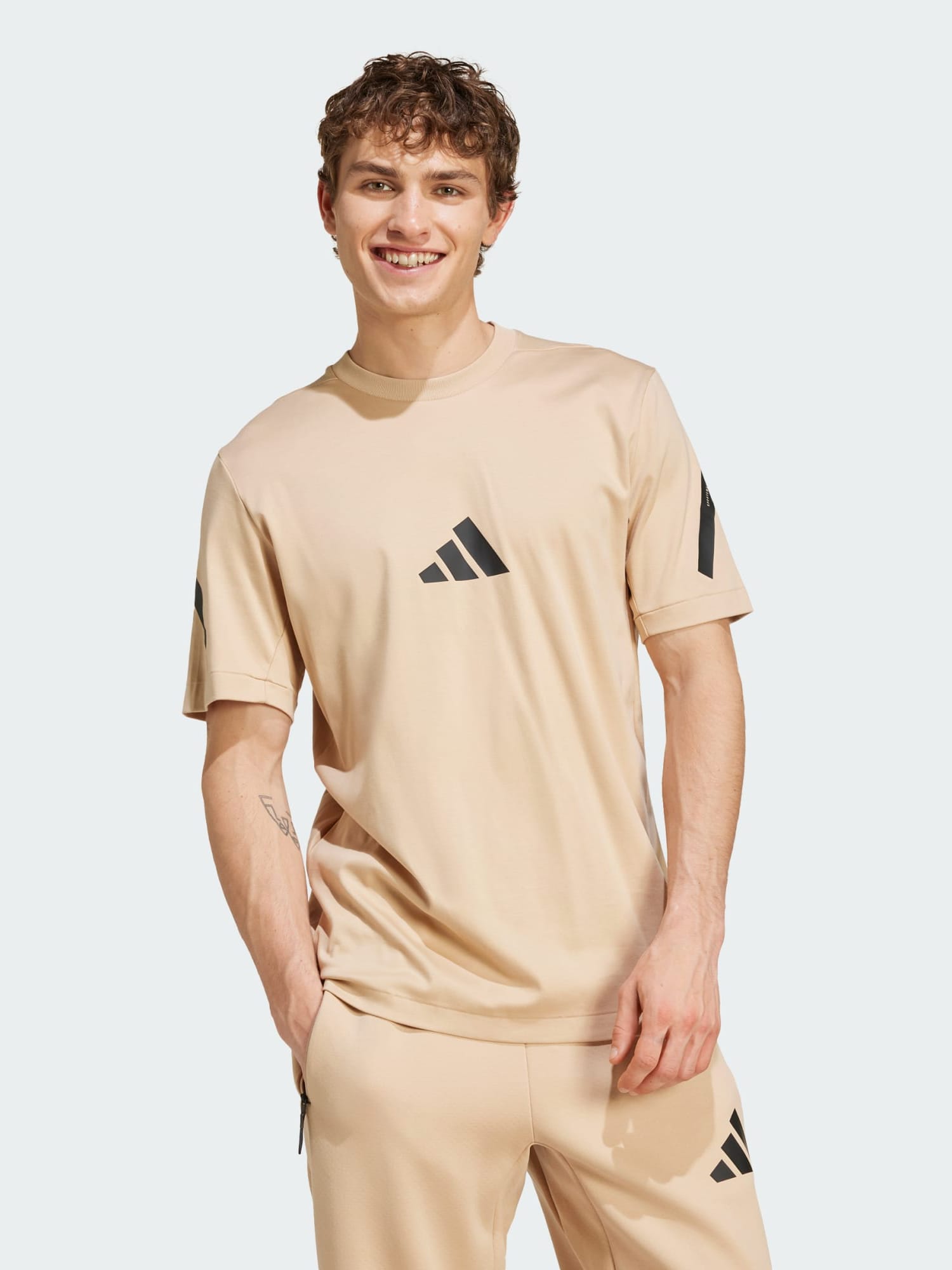 Акція на Футболка бавовняна довга чоловіча Adidas M Z.N.E. Tee JF2453 2XL Бежева від Rozetka