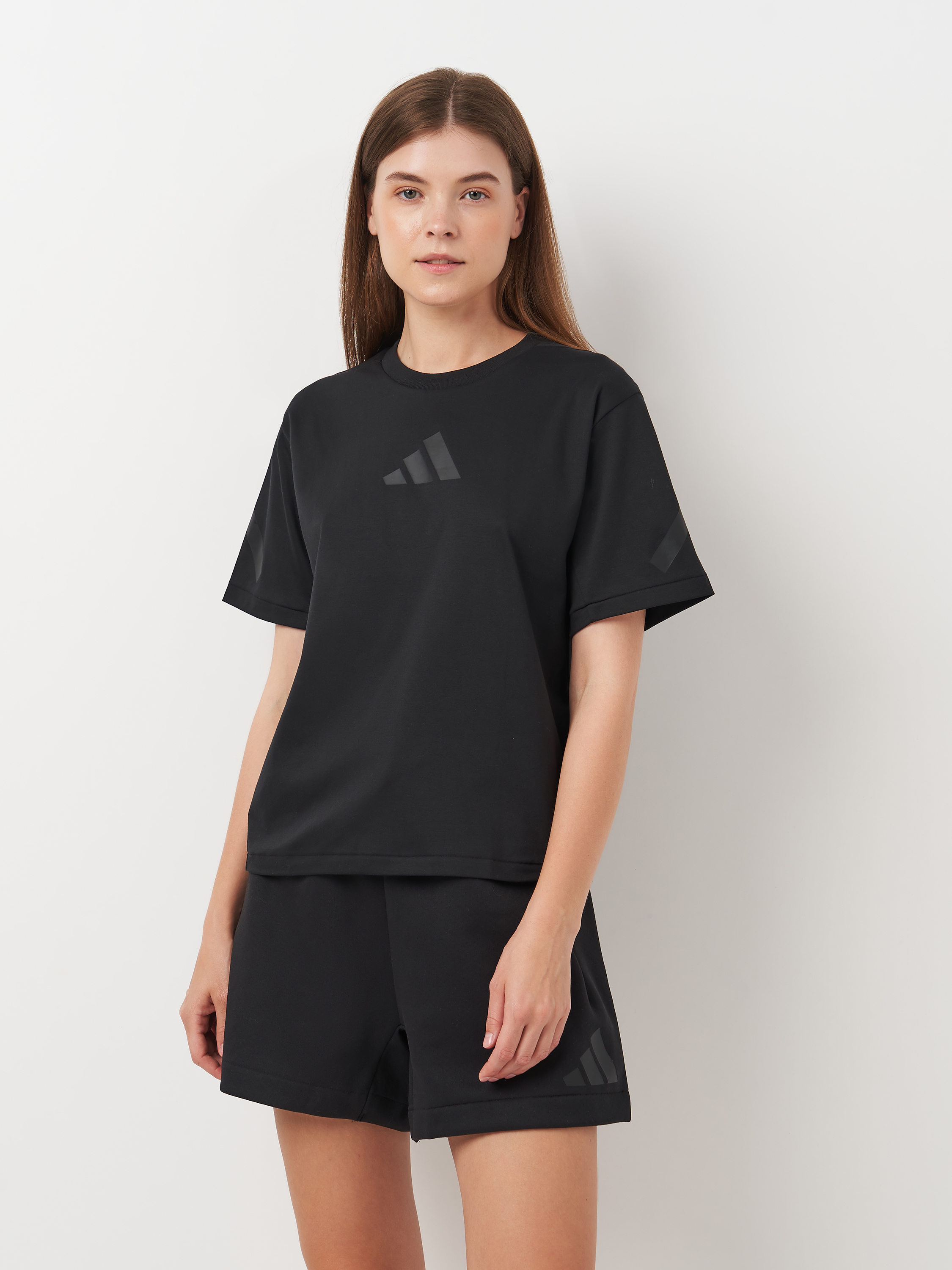 Акція на Футболка бавовняна жіноча Adidas W Z.N.E. Tee JE7846 S Чорна від Rozetka