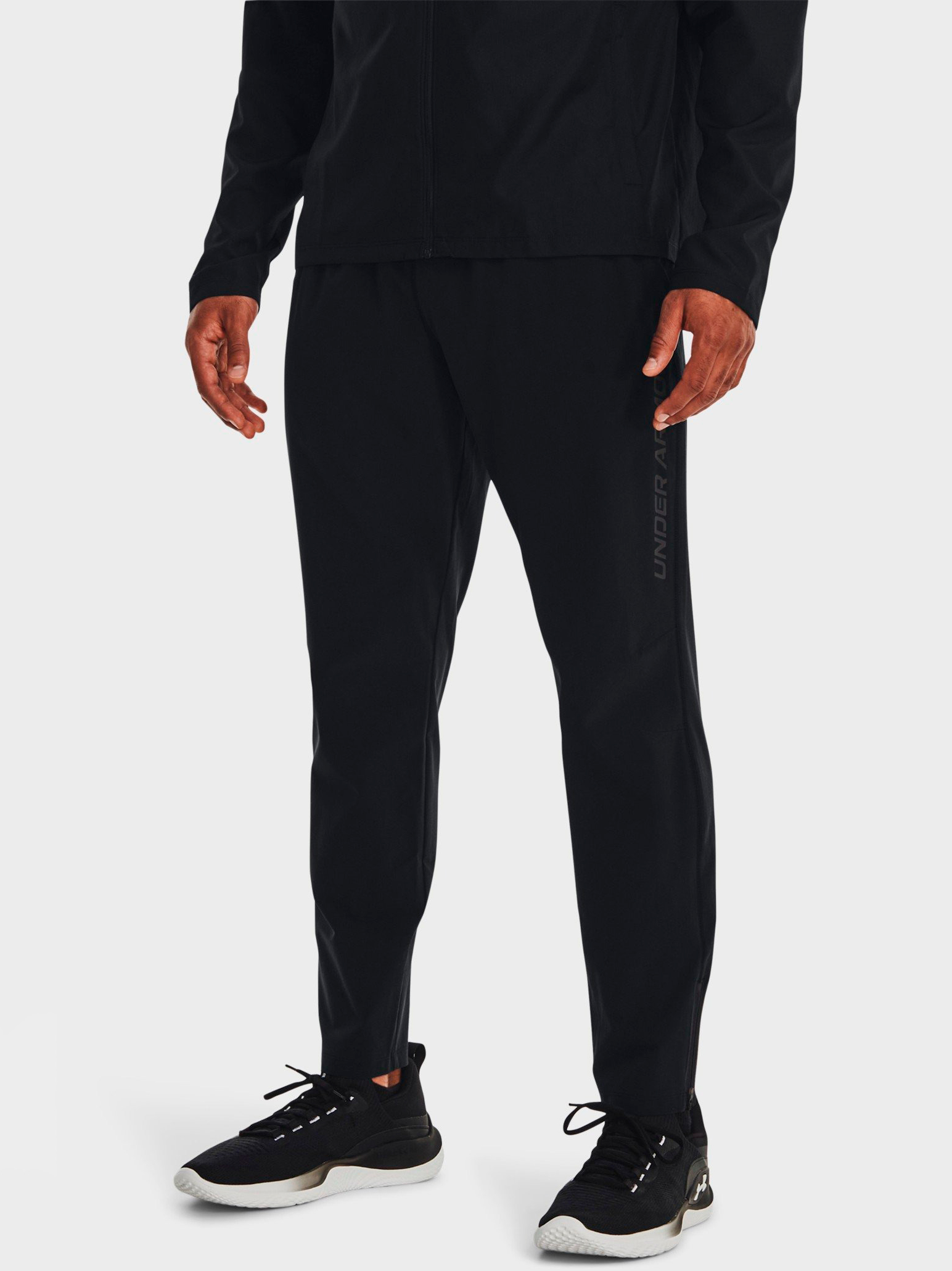 Акція на Спортивні штани чоловічі Under Armour Ua Storm Run Pants 1376800-001 M Чорні від Rozetka