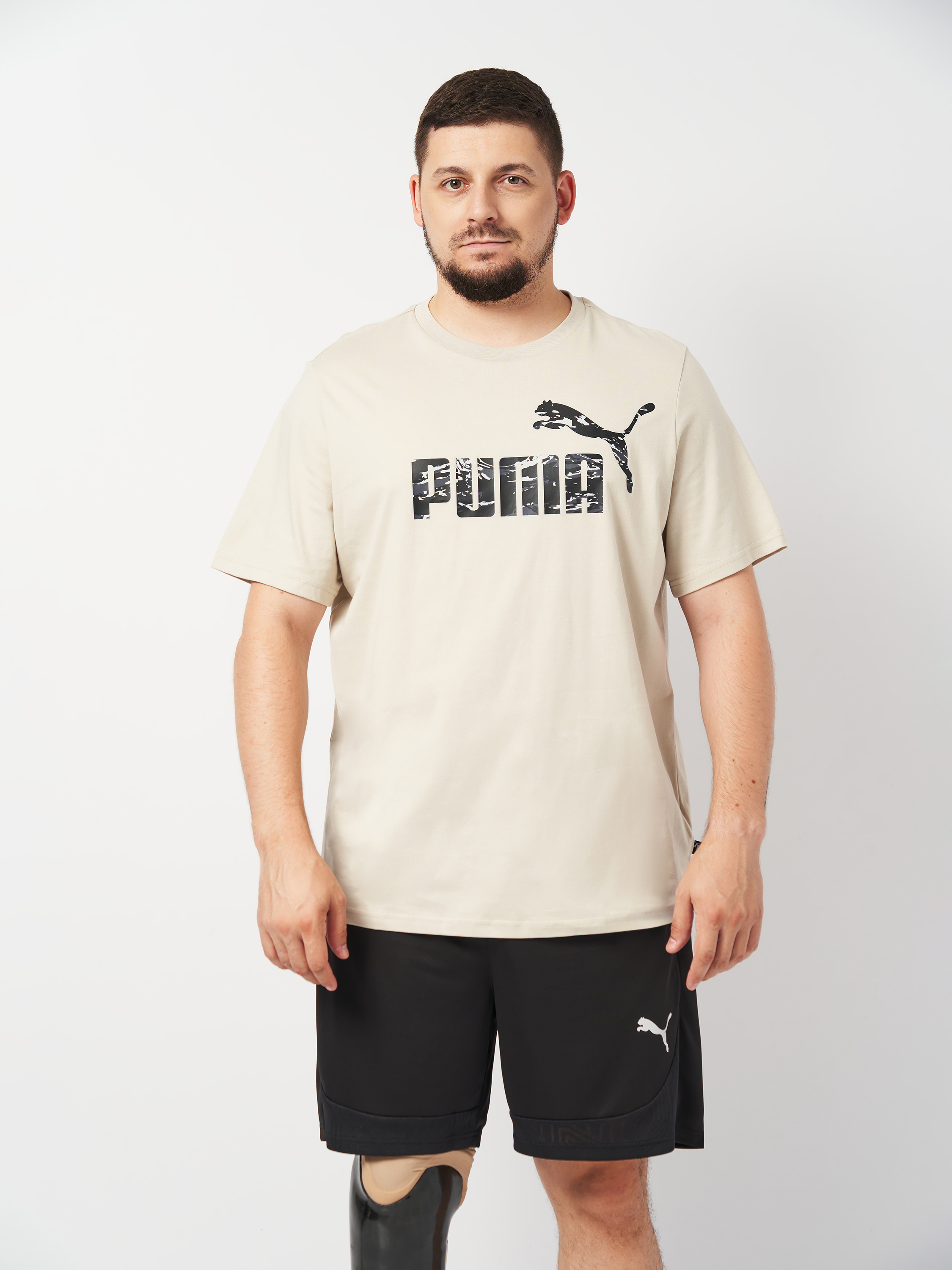 Акція на Футболка бавовняна чоловіча Puma Ess+ Camo Graphic Tee 68323668 XXL Бежева від Rozetka