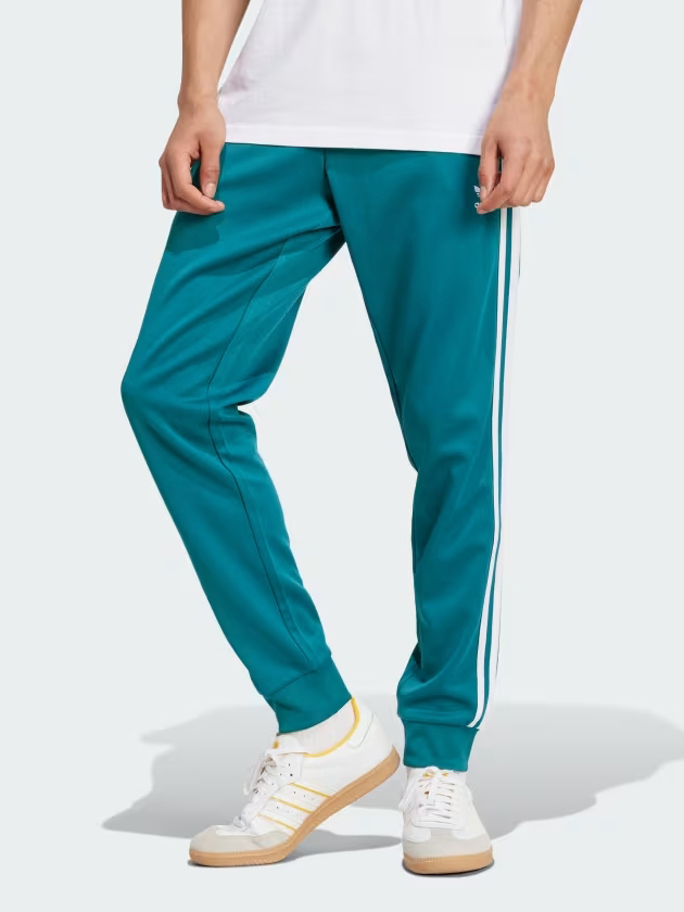 Акція на Спортивні штани чоловічі Adidas Originals Sst Tp IY9862 M Бірюзові від Rozetka