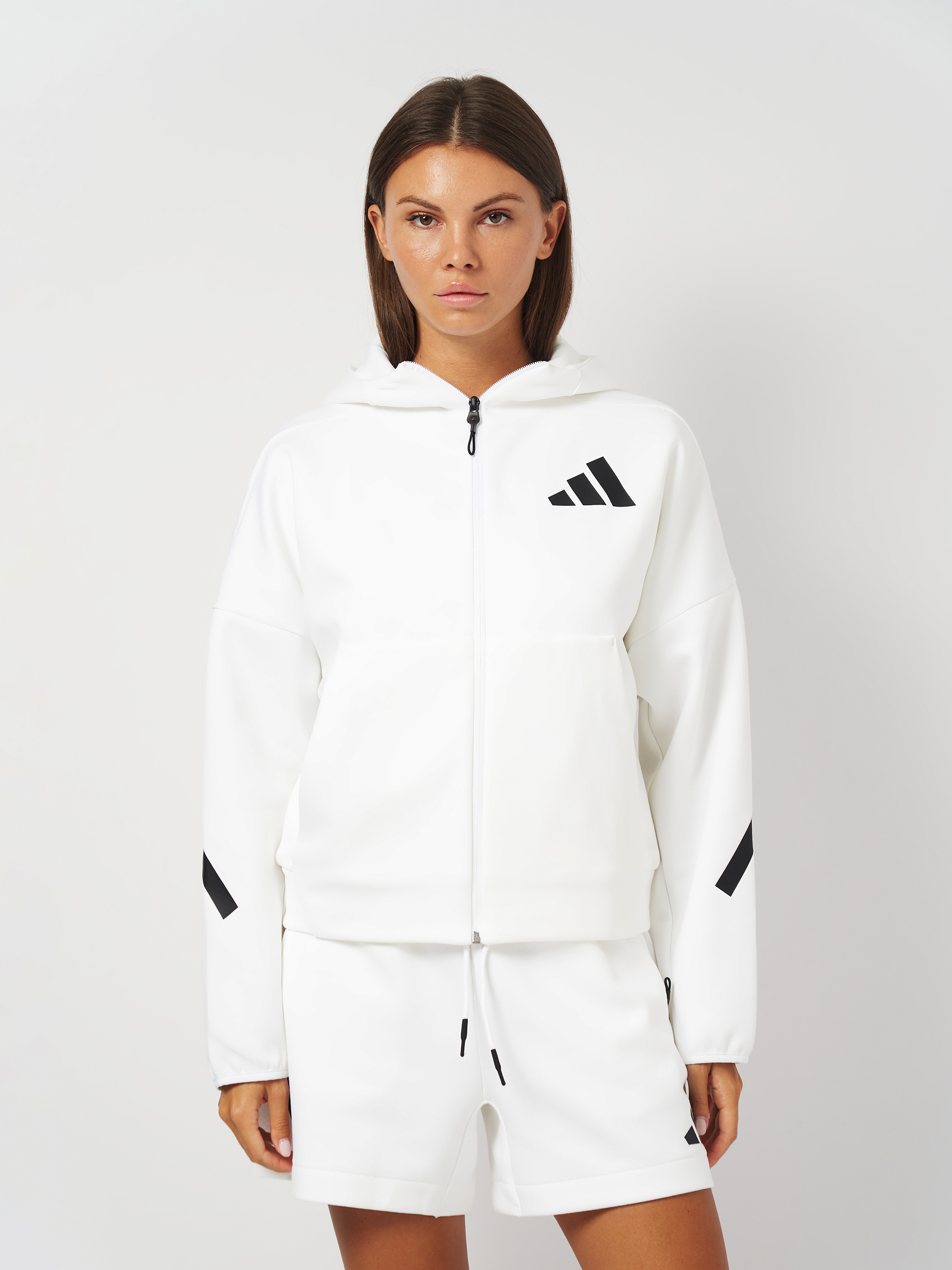 Акція на Толстовка жіноча Adidas W Z.N.E. Fz JE7849 XL White від Rozetka