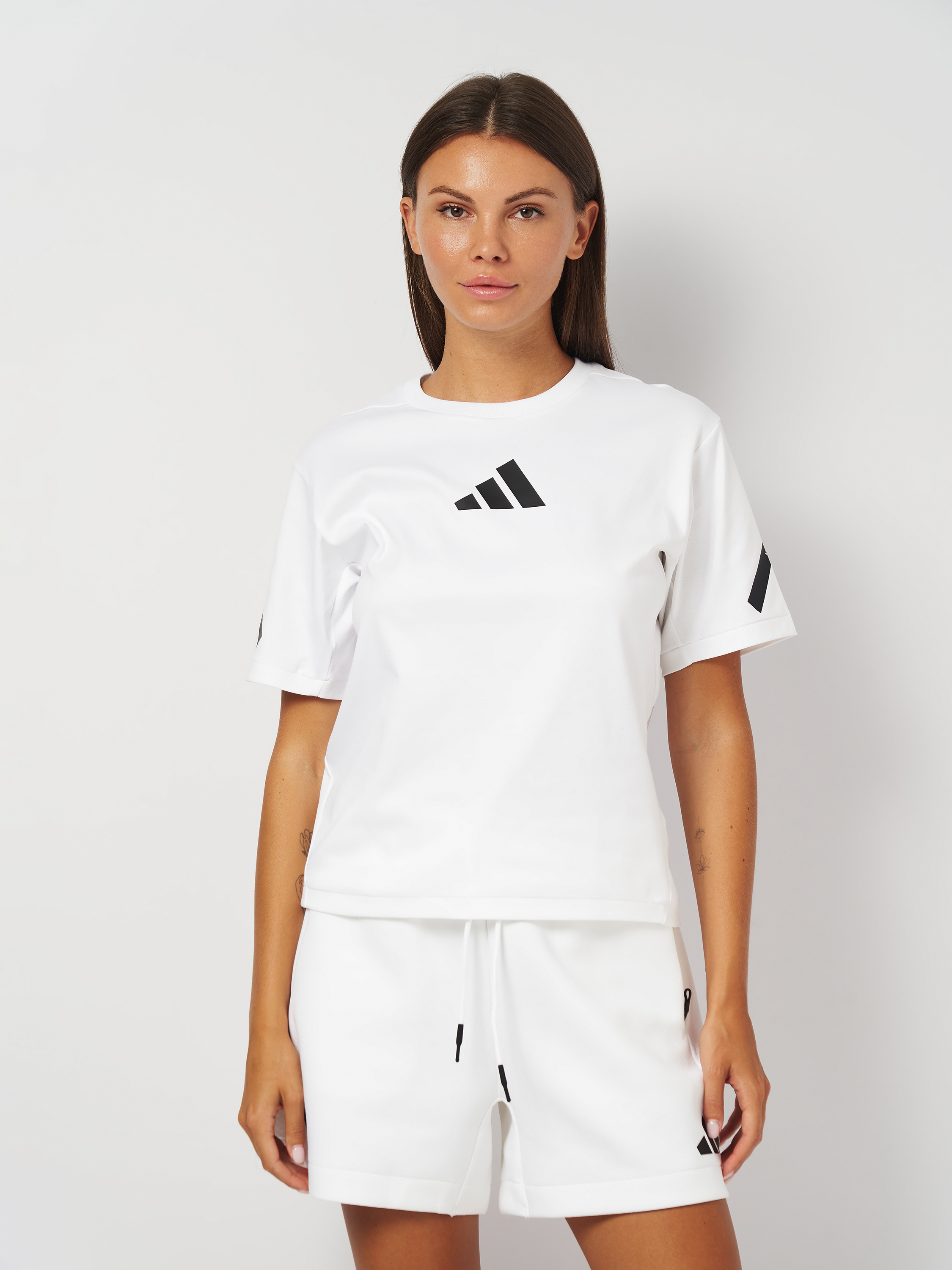 Акція на Футболка бавовняна жіноча Adidas W Z.N.E. Tee JE7857 M White від Rozetka