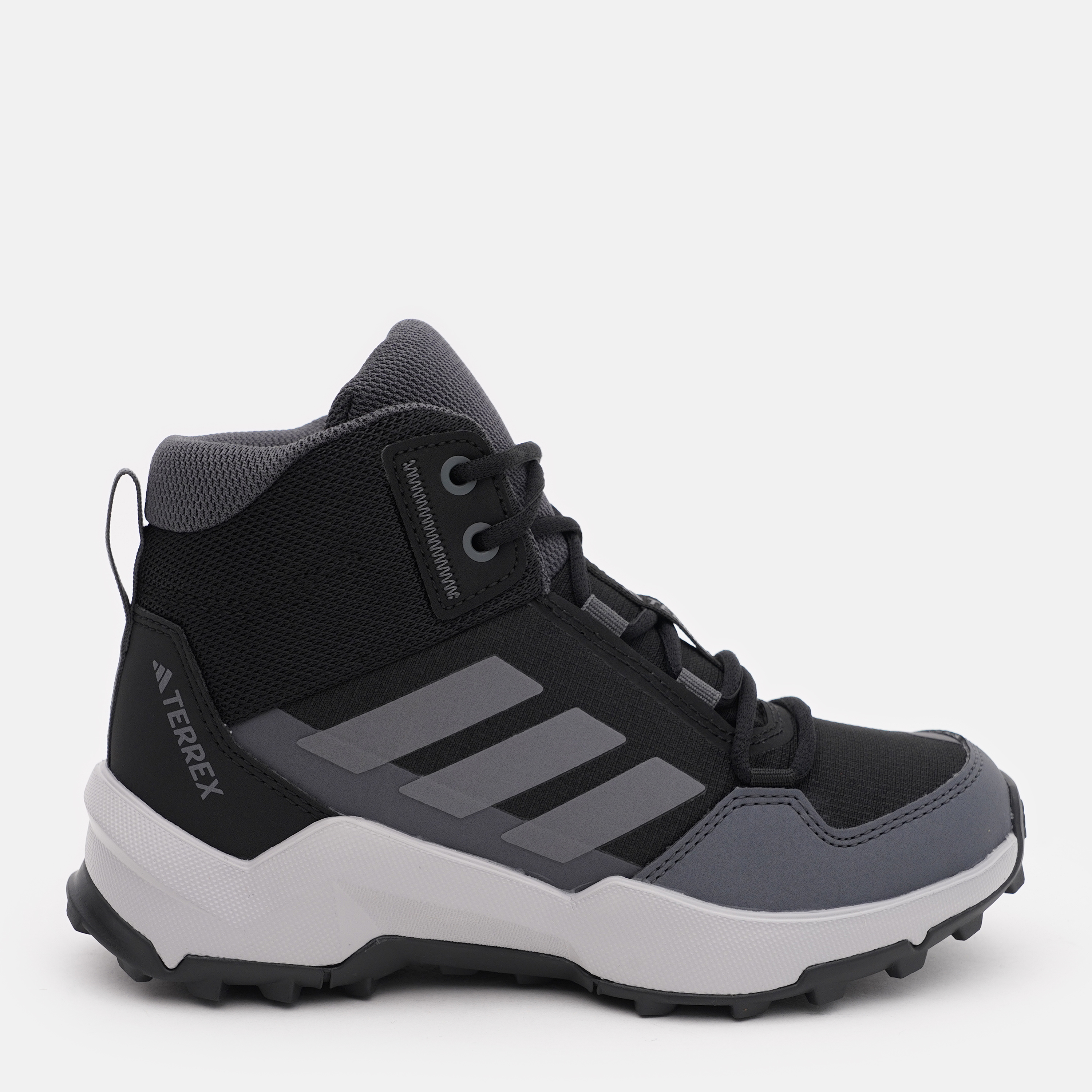 Акція на Дитячі зимові черевики для хлопчика Adidas Terrex Ax4R Mid K IF6520 30 Чорні від Rozetka