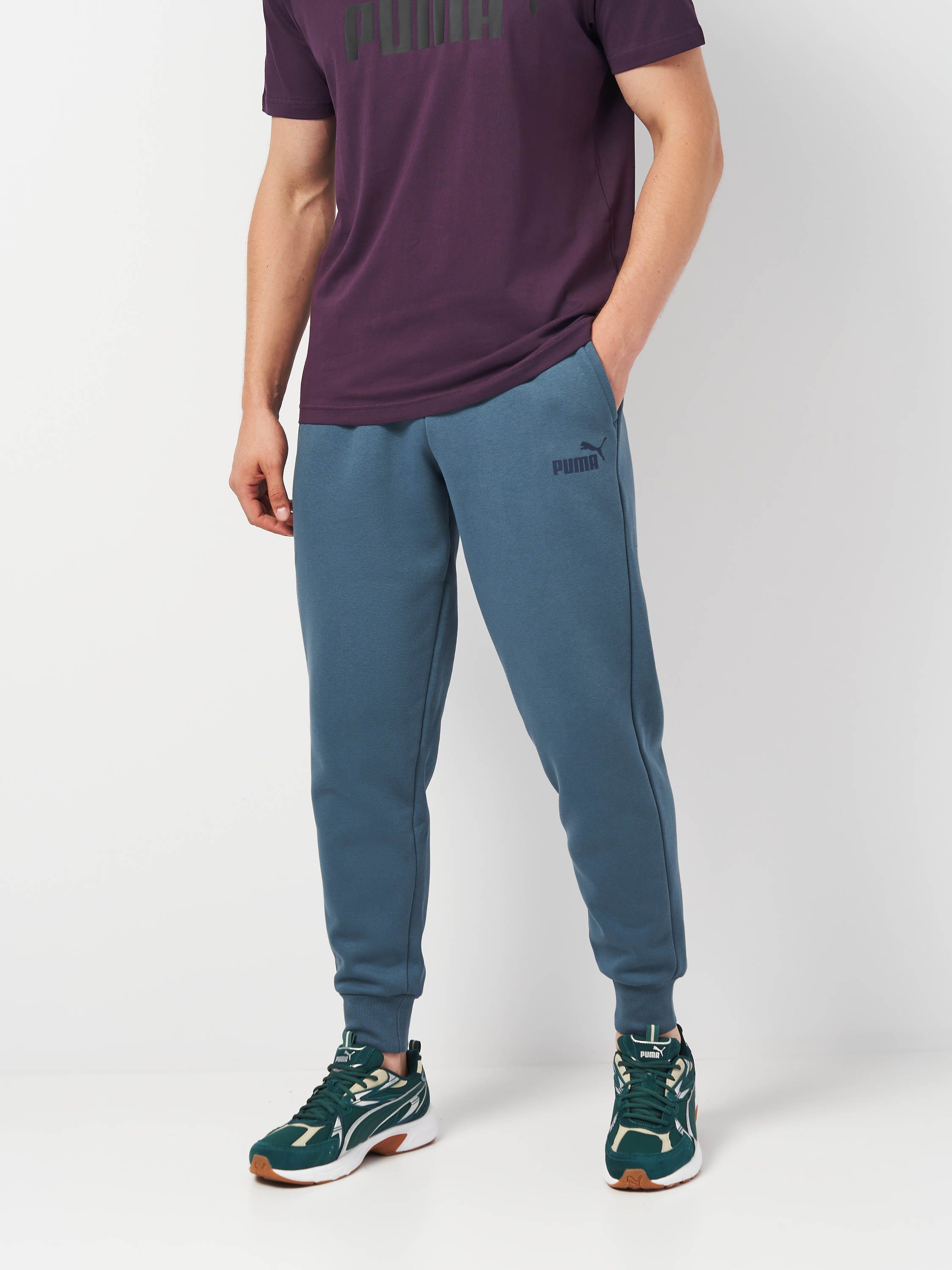 Акція на Спортивні штани чоловічі Puma Ess Logo Pants 58671537 M Зелені від Rozetka