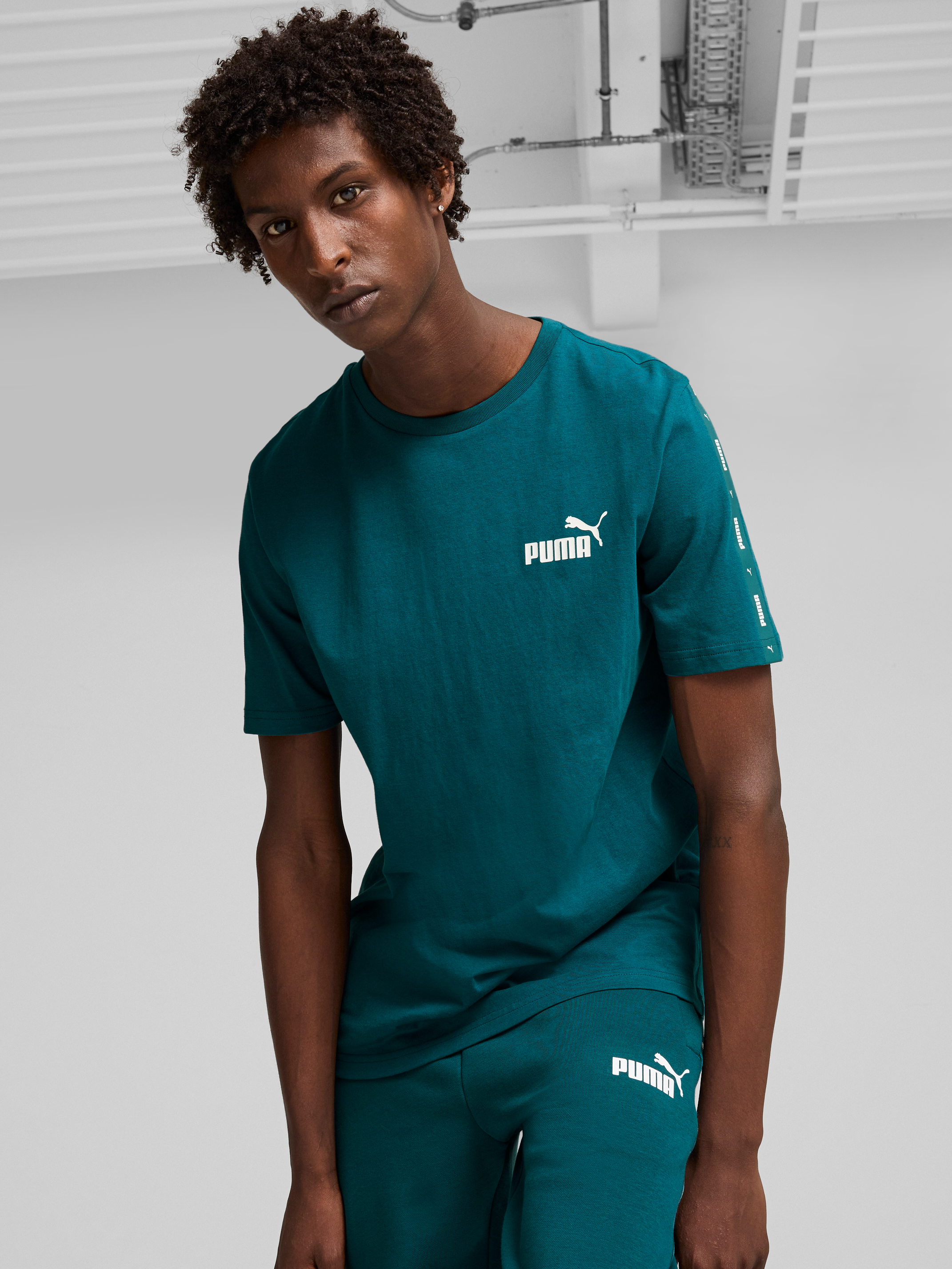 Акція на Футболка бавовняна чоловіча Puma Ess+ Tape Tee 84738208 M Зелена від Rozetka