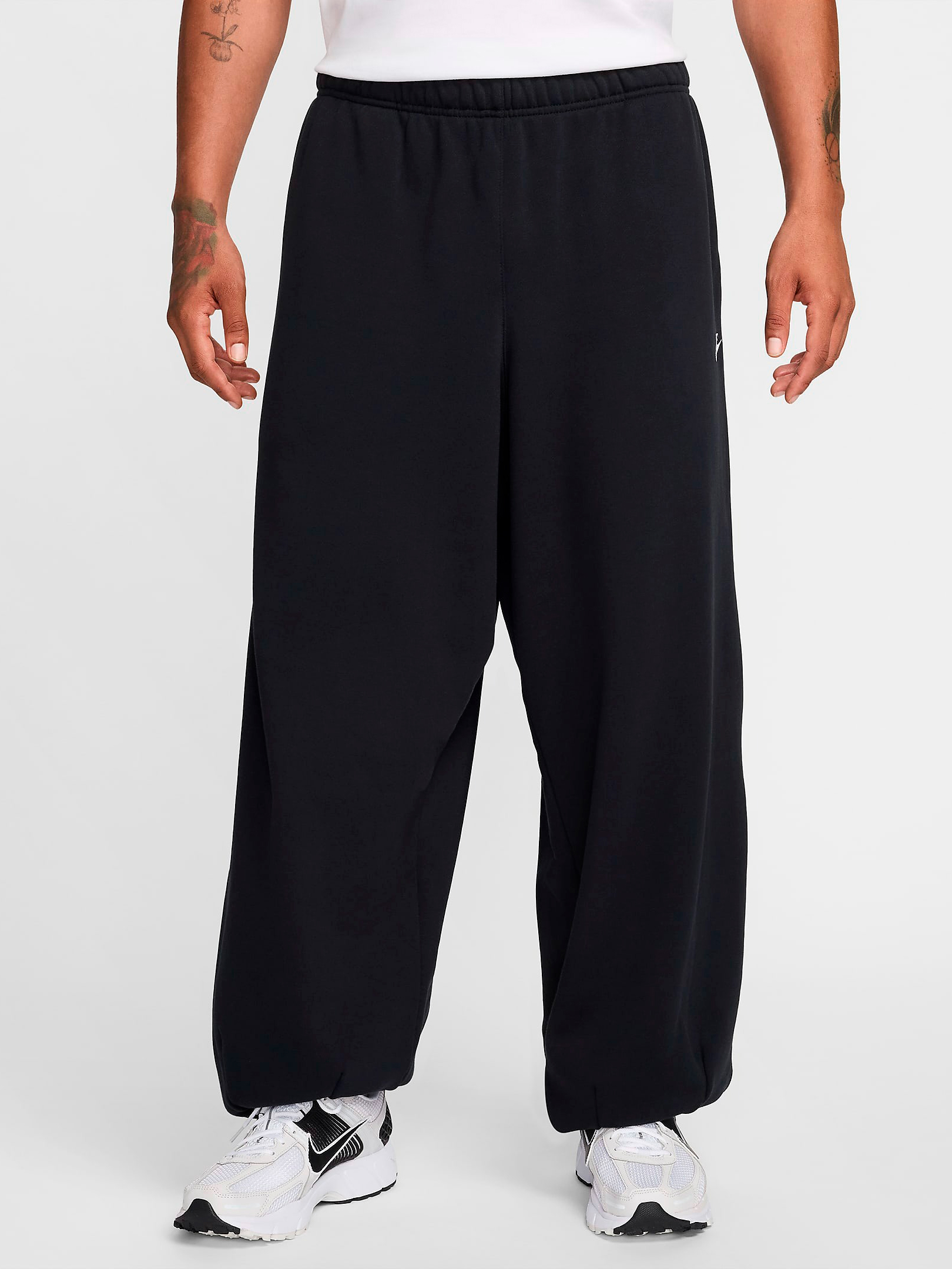 Акція на Спортивні штани утеплені чоловічі Nike M Nk Club Ft Oversized Pant HJ1822-010 M Чорні від Rozetka