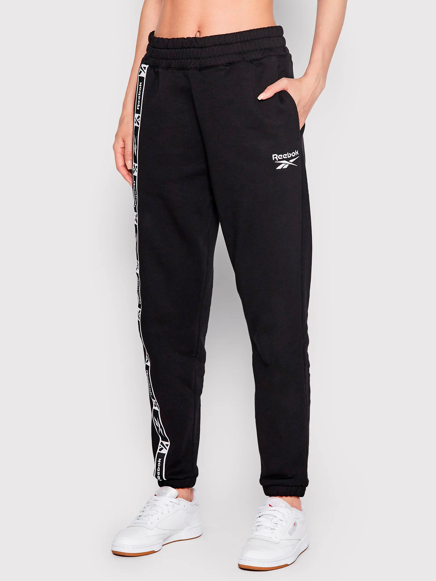 Акція на Спортивні штани жіночі Reebok Tape Pack Pant HB2261 M Чорні від Rozetka