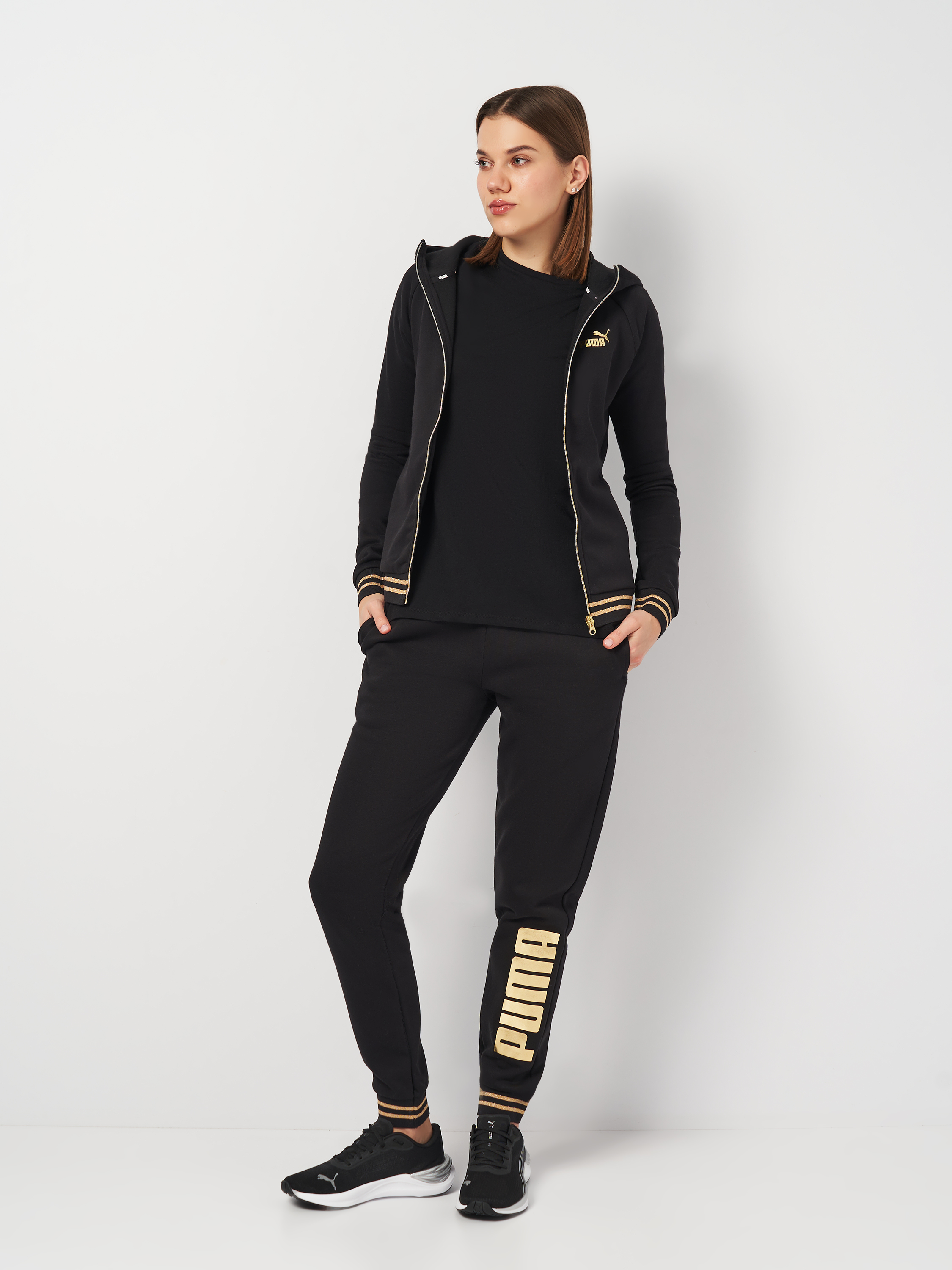 Акція на Спортивний костюм жіночий Puma Tracksuits 84760601 S Чорний від Rozetka