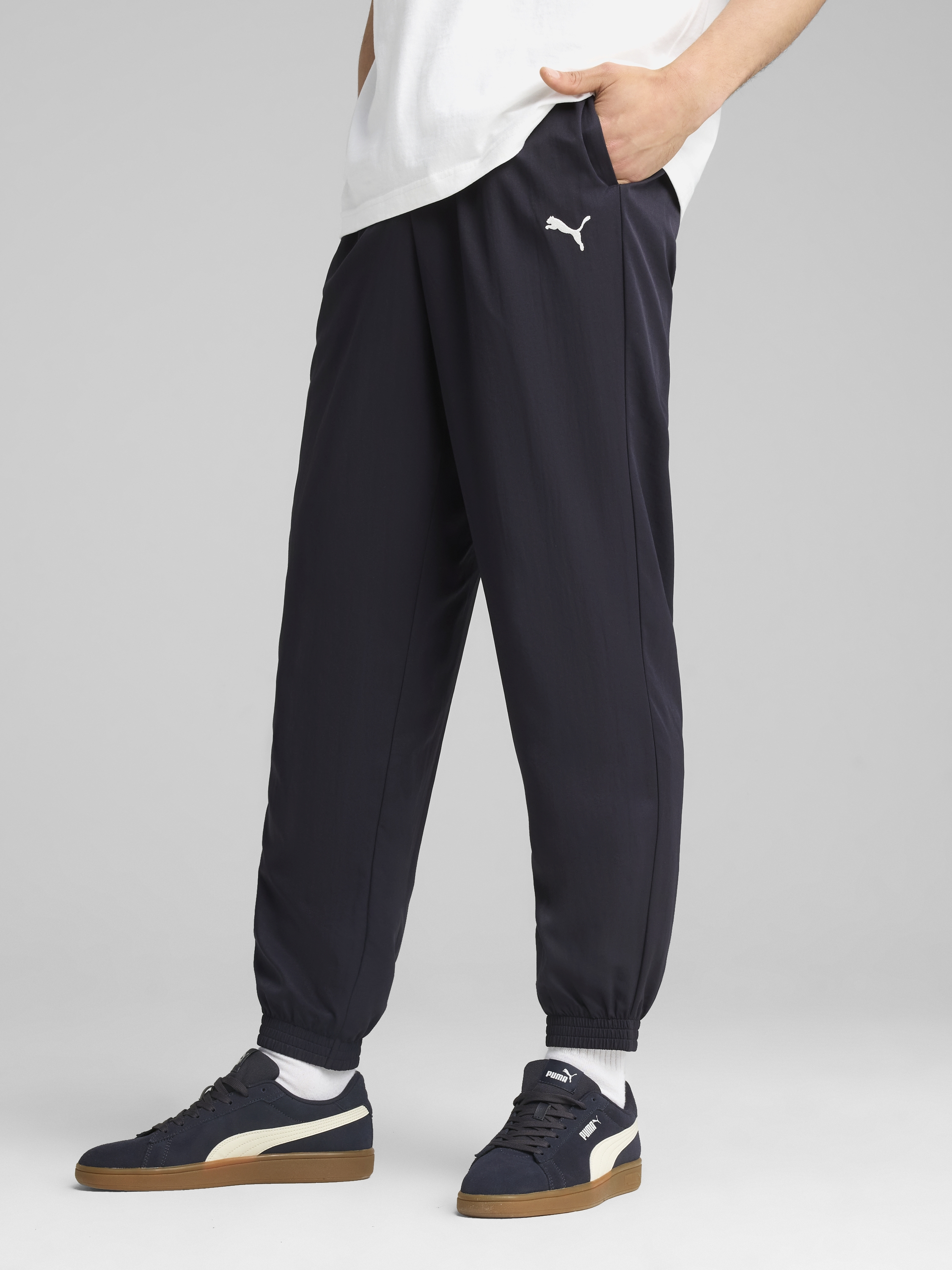 Акція на Спортивні штани чоловічі Puma Ess Woven Pants Cl 68262216 2XL New Navy від Rozetka