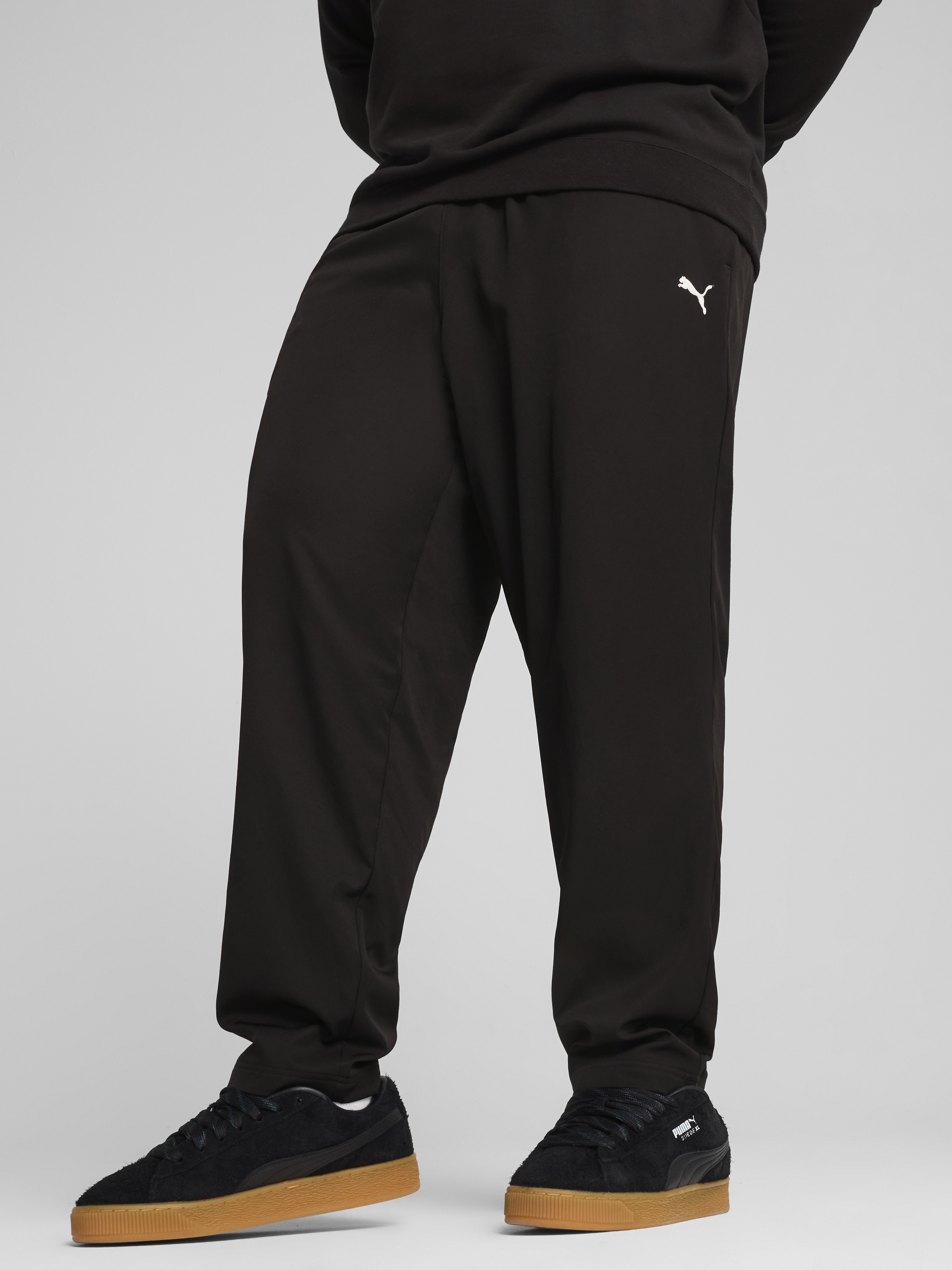 Акція на Спортивні штани чоловічі Puma Ess Woven Pants Op 68262401 M Black від Rozetka