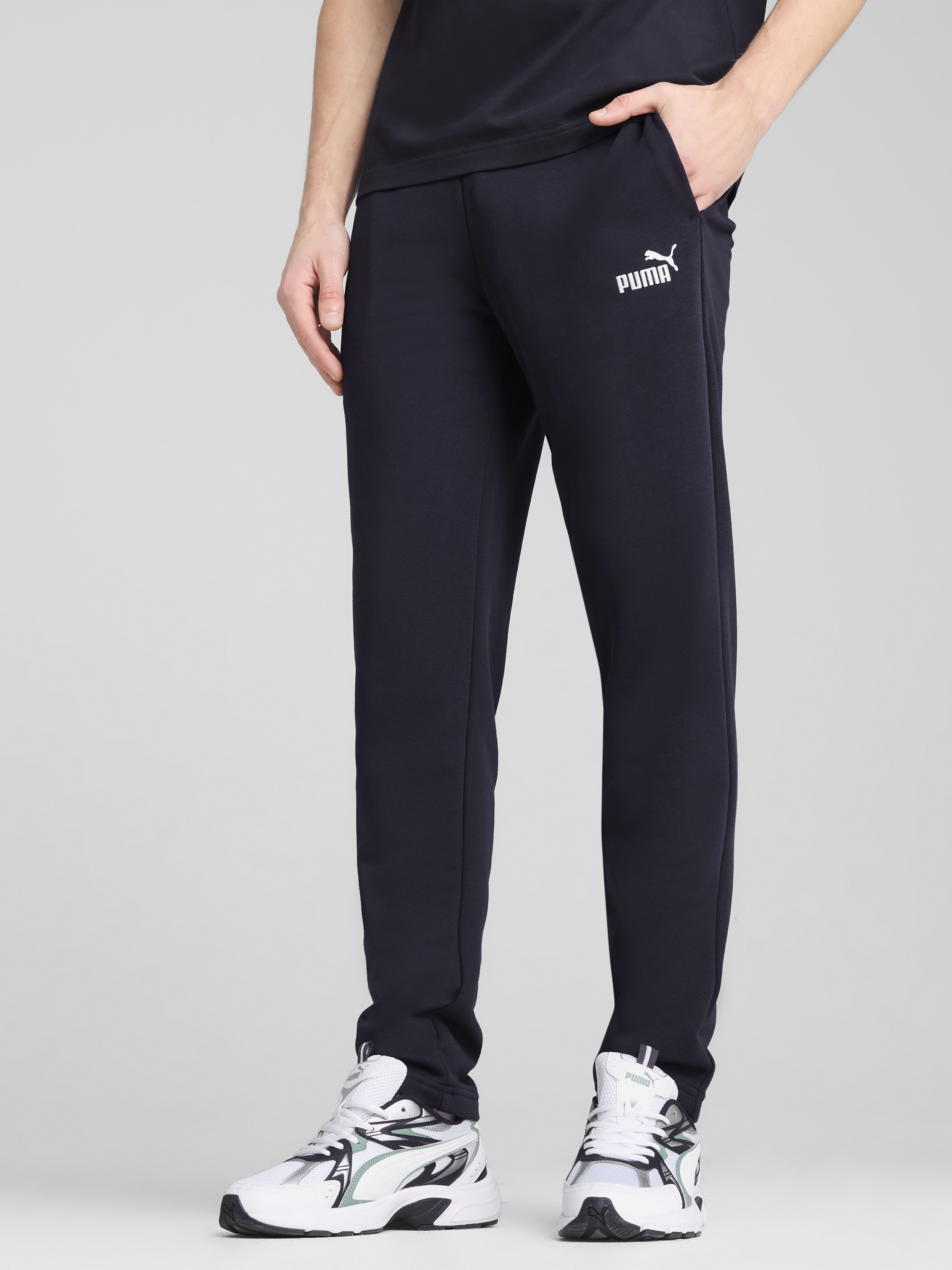 Акція на Спортивні штани чоловічі Puma Ess No. 1 Logo Sweatpants Tr Op 68261216 XL New Navy від Rozetka