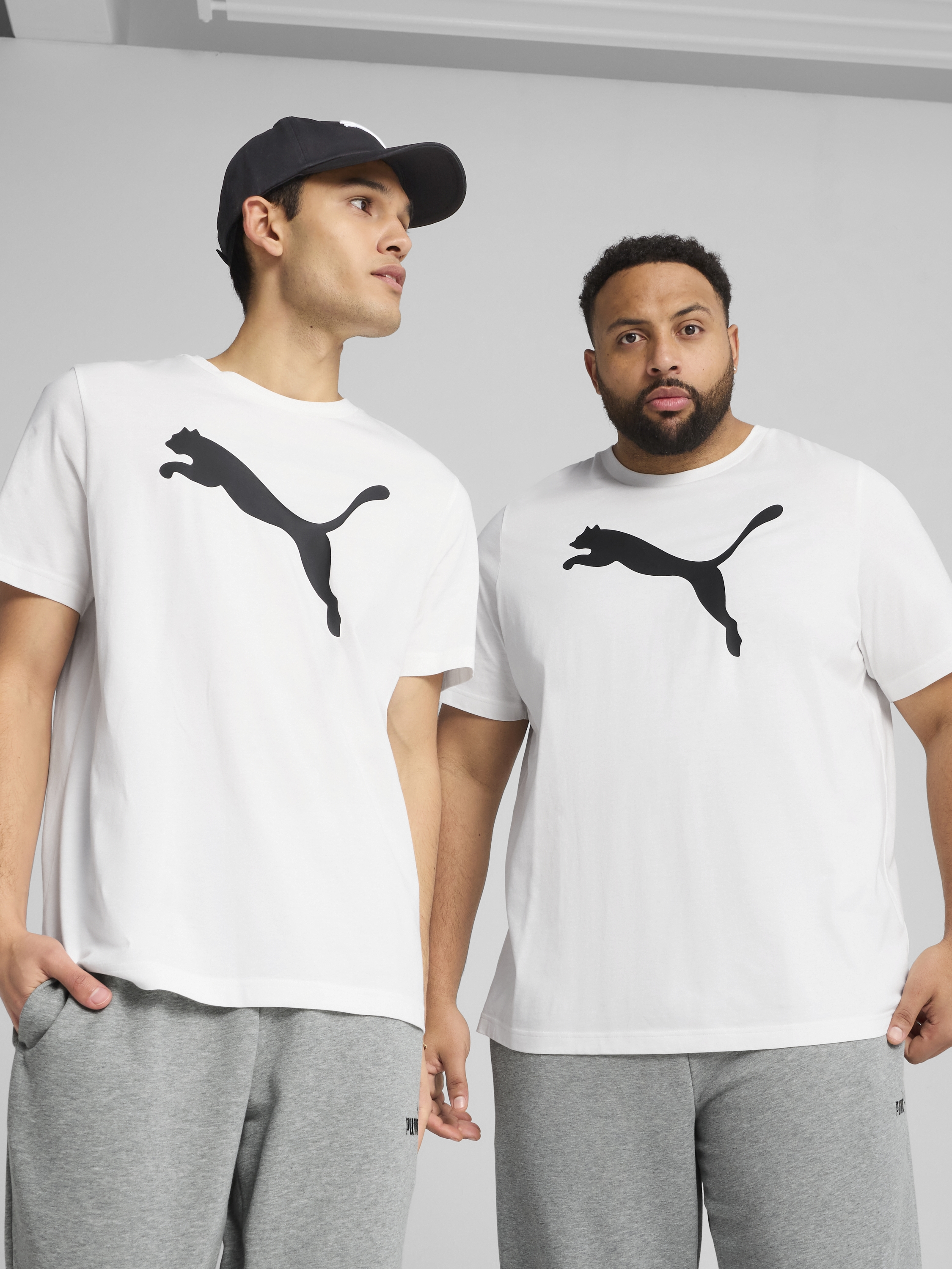 Акція на Футболка бавовняна довга чоловіча Puma Ess Tee 68253602 S White з принтом від Rozetka