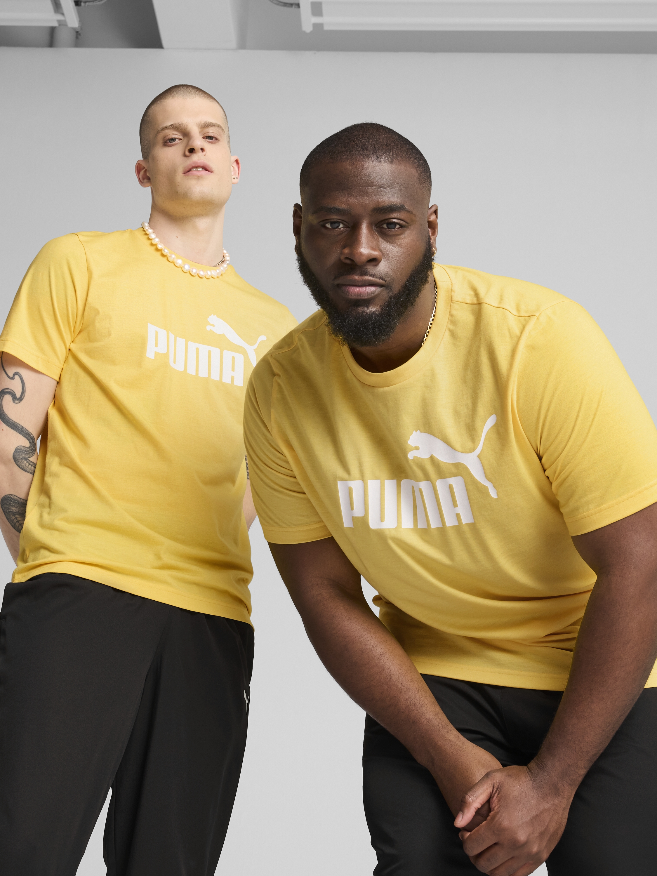 Акція на Футболка бавовняна довга чоловіча Puma Ess No. 1 Logo Heather Tee (S) 68255155 S Sunny Yellow з принтом від Rozetka