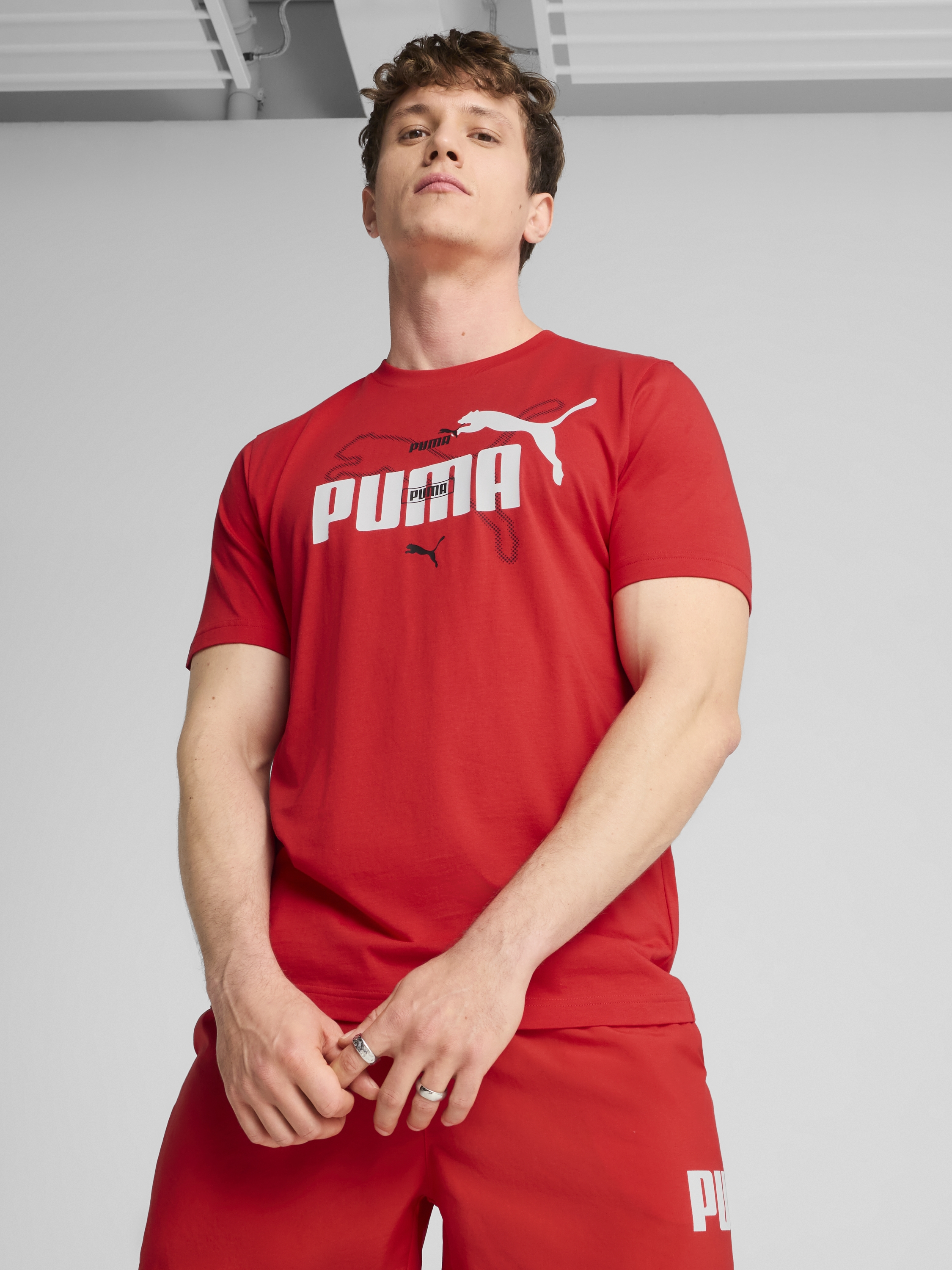 Акція на Футболка бавовняна довга чоловіча Puma Ess Logo Lab Summer Tee 68467111 L For All Time Red з принтом від Rozetka