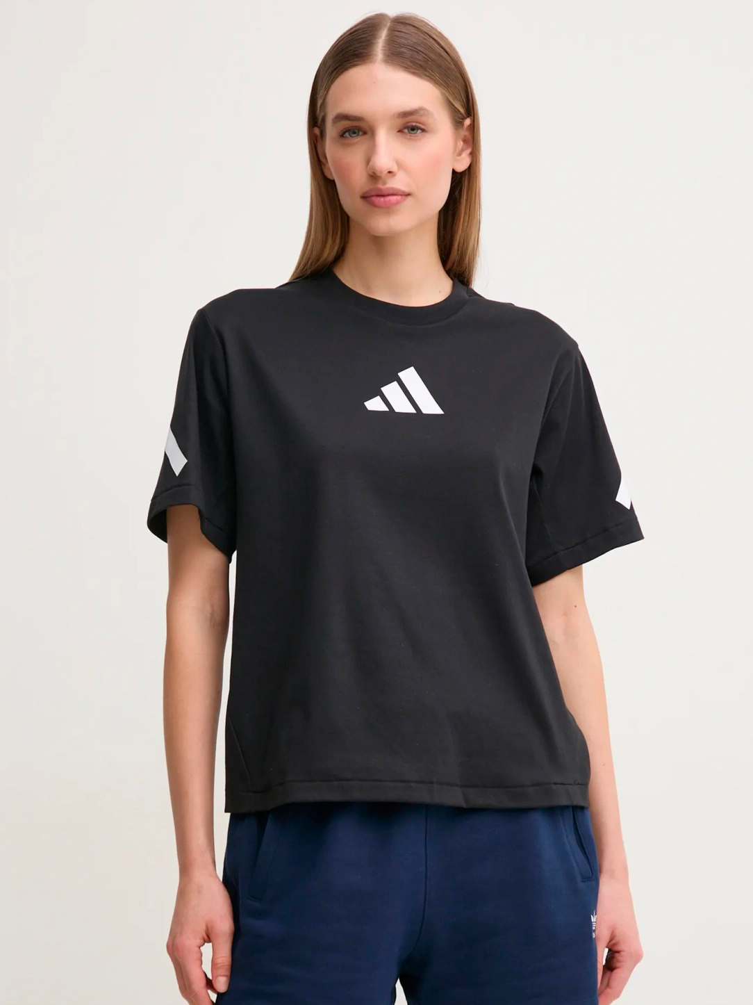 Акція на Футболка бавовняна жіноча Adidas W Z.N.E. Tee JJ4778 S Black/White від Rozetka