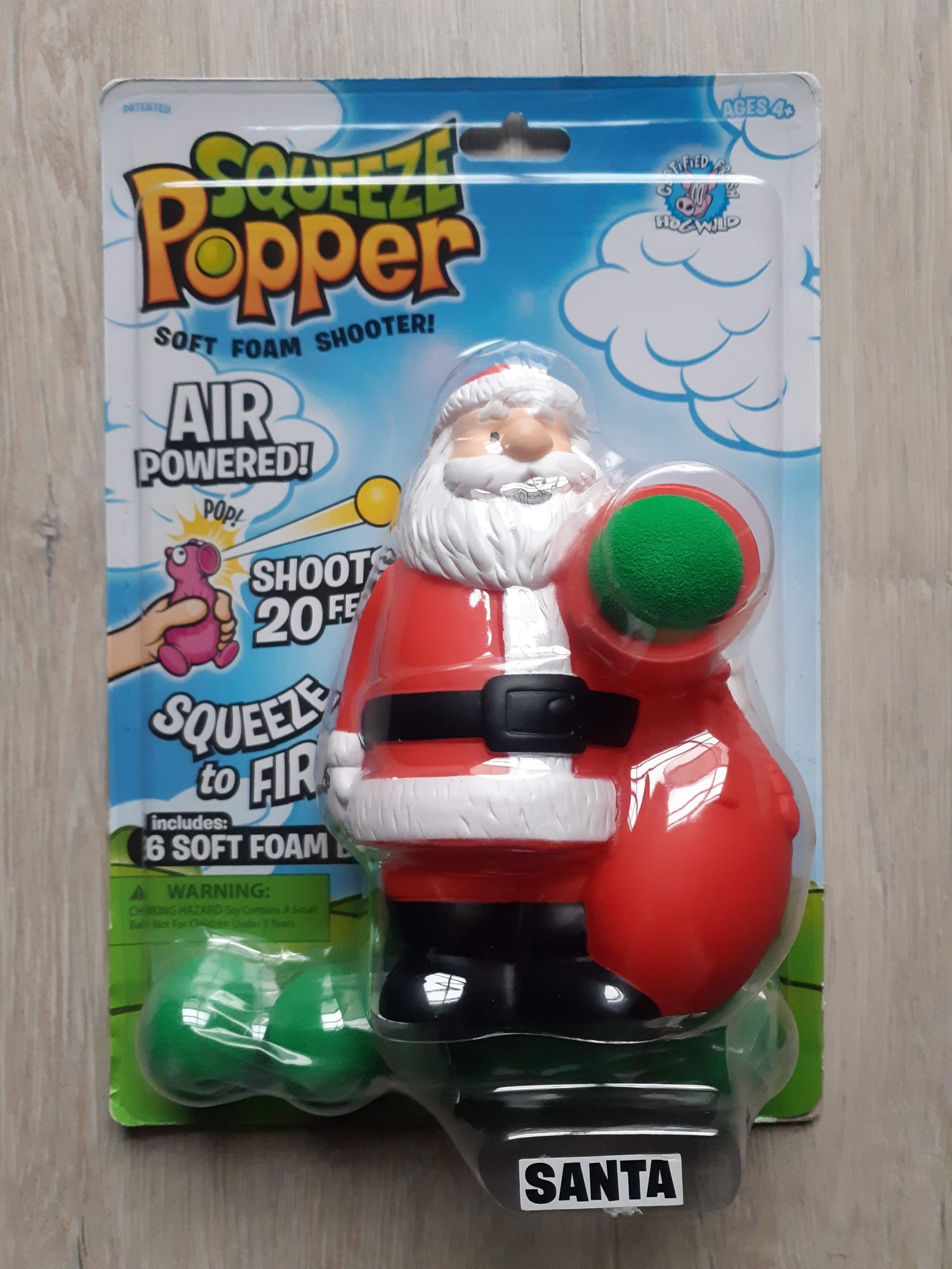 

Игровая фигурка Squeeze Popper Нажми и стреляй Санта 54511