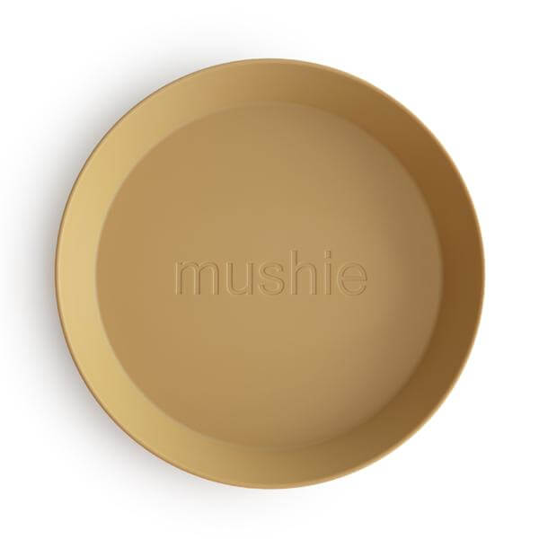 

Круглая плоская тарелка Mushie Caramel