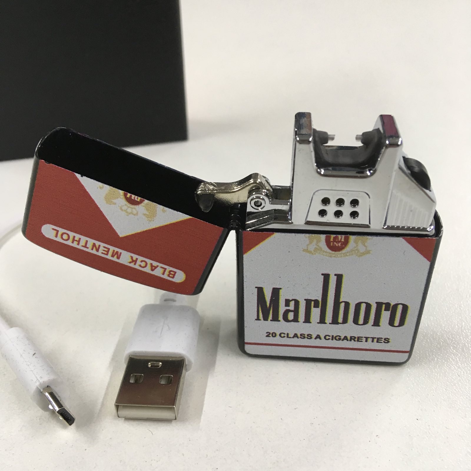

Зажигалка UKC аккумуляторная импульсная USB 6х4см Белая (Marlboro-7035)