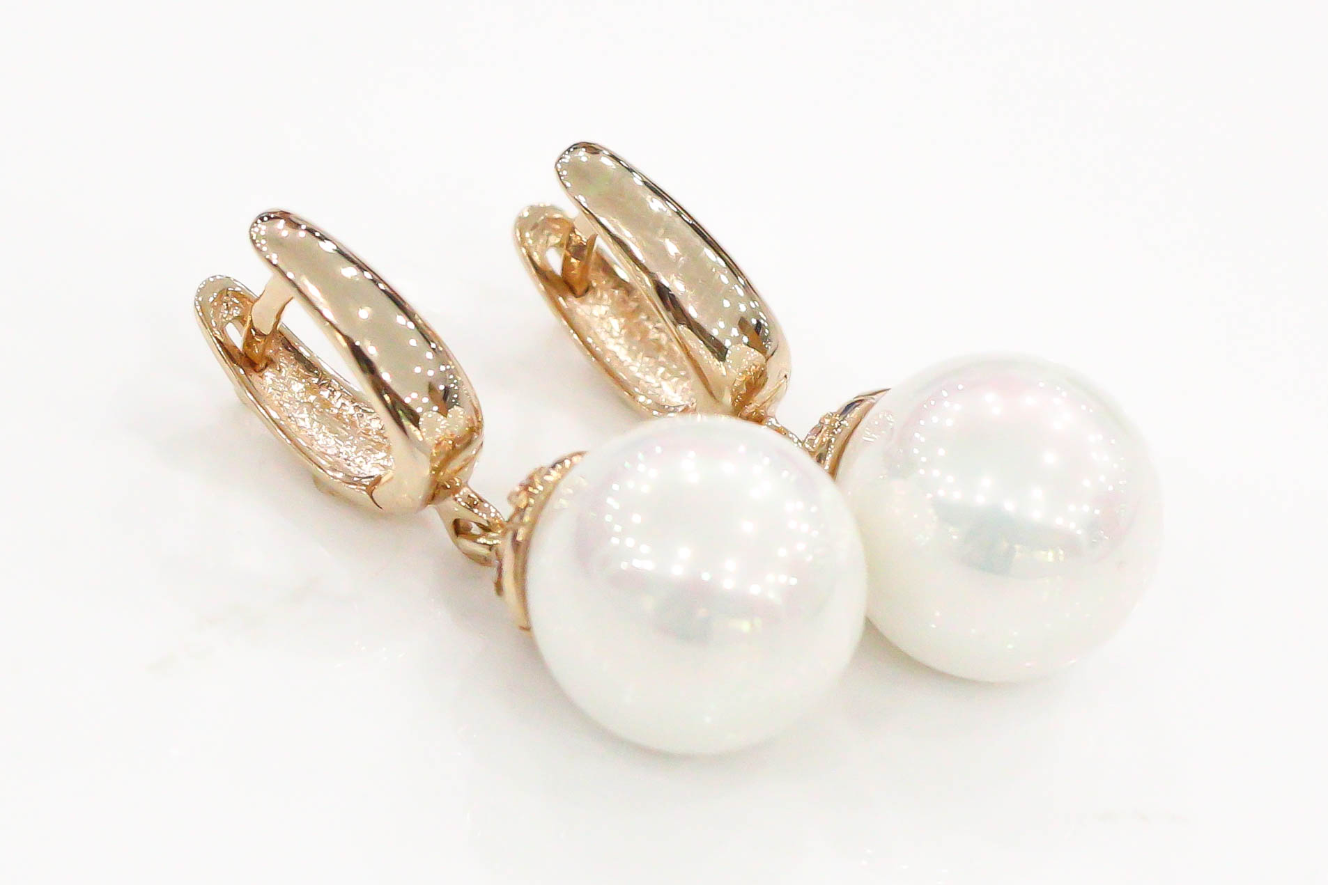 

Серьги с жемчугом и фианитами 12035а Диамант