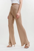 Женские вязаные штаны клеш в рубчик темно-бежевые от продавца: Malvy Cvit –в интернет-магазине ROZETKA