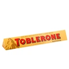Швейцарський молочний шоколад TOBLERONE з медом та мигдальною нугою, 100 г