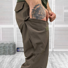 Чоловічі міцні Штани із накладними кишенями та манжетами / Щільні еластичні Брюки Capture олива розмір 2XL - зображення 4