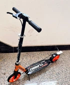Самокат Skyper "Turbo" TR-15100 сталева рама, ручне дискове гальмо, діаметр PU коліс - 200мм, 2 амортизатори, в коробці