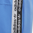 Dziecięce spodnie dresowe dla dziewczynki Adidas Track Pants ED7878 128 cm Błękitne (4061619590203) - obraz 4