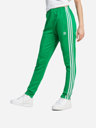 Спортивні штани жіночі adidas IK6601 L Зелені (4066761198994) - зображення 1