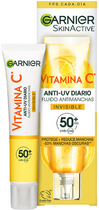 Сонцезахисний флюїд для обличчя Garnier Skinactive Invisible anti-spot with Vitamin C SPF 50+ 40 мл (3600542572965) - зображення 1