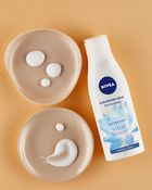 Очищуючее молочко для обличчя Nivea освіжаюче для нормальної та комбінованої шкіри 200 мл (4005808195145) - зображення 3