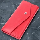 Жіночий великий горизонтальний гаманець із натуральної шкіри ST Leather червоного кольору з геометричним клапаном та застібкою кнопкою (bg225fash45)