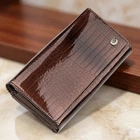 Гаманець жіночий ST Leather із натуральної лакованої шкіри коричневого кольору для прав великий горизонтальний формат з кнопкою (bg184fash31)